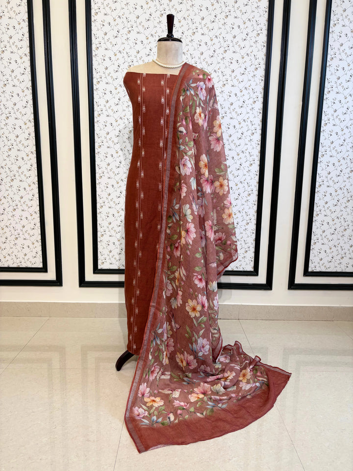 Rosewood linen suit with minimal white thread embroidery on kurta and floral digital printed dupatta, perfect for summer events and festive daywear.