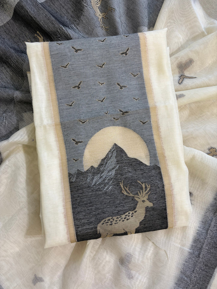 Grey and ivory Jamdaani suit with woven mountain, deer, and bird motifs, made with fine handloom weaving, perfect for winter and festive occasions.