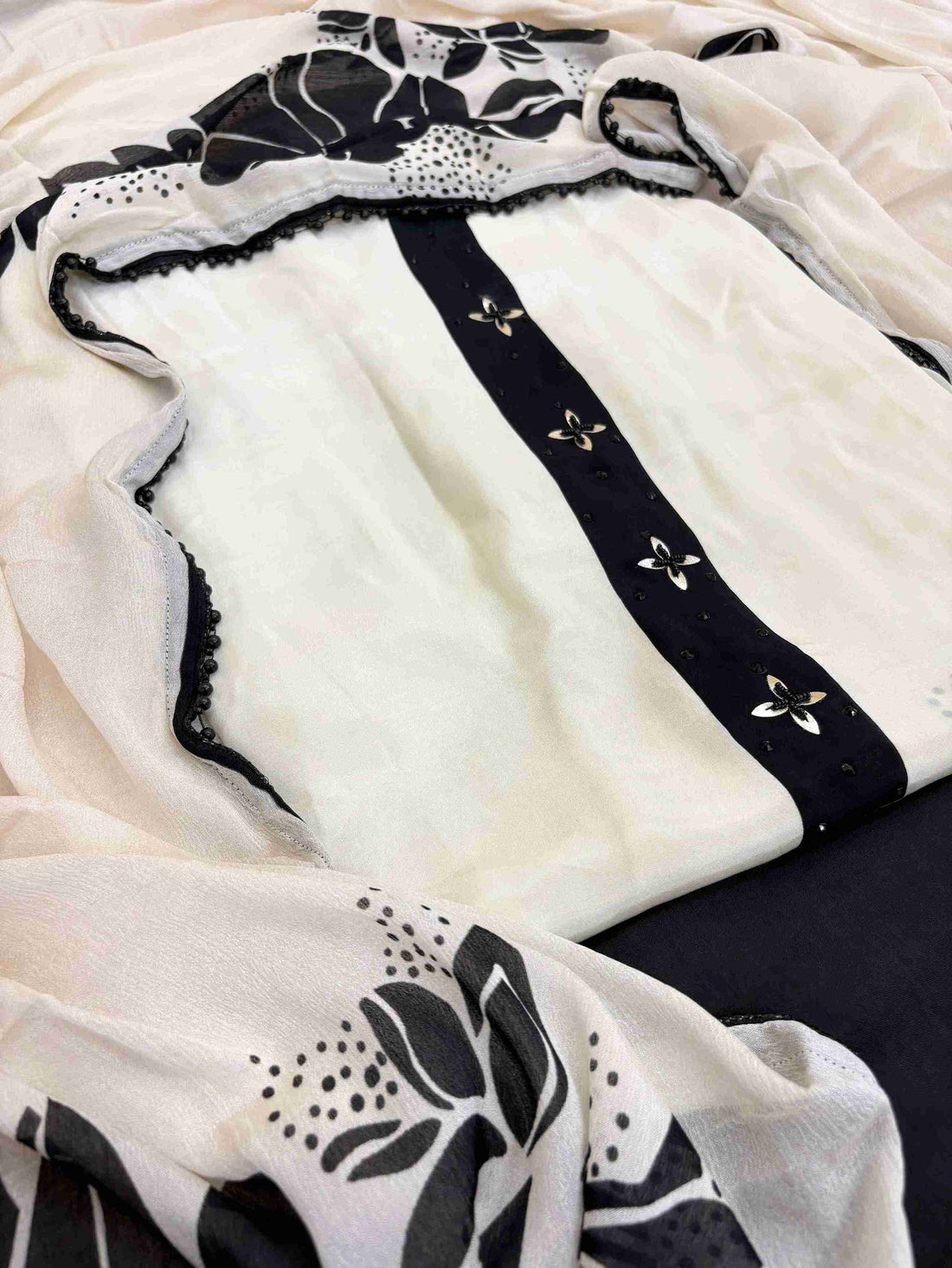 black and white crepe unstitched suit for women in black and white color