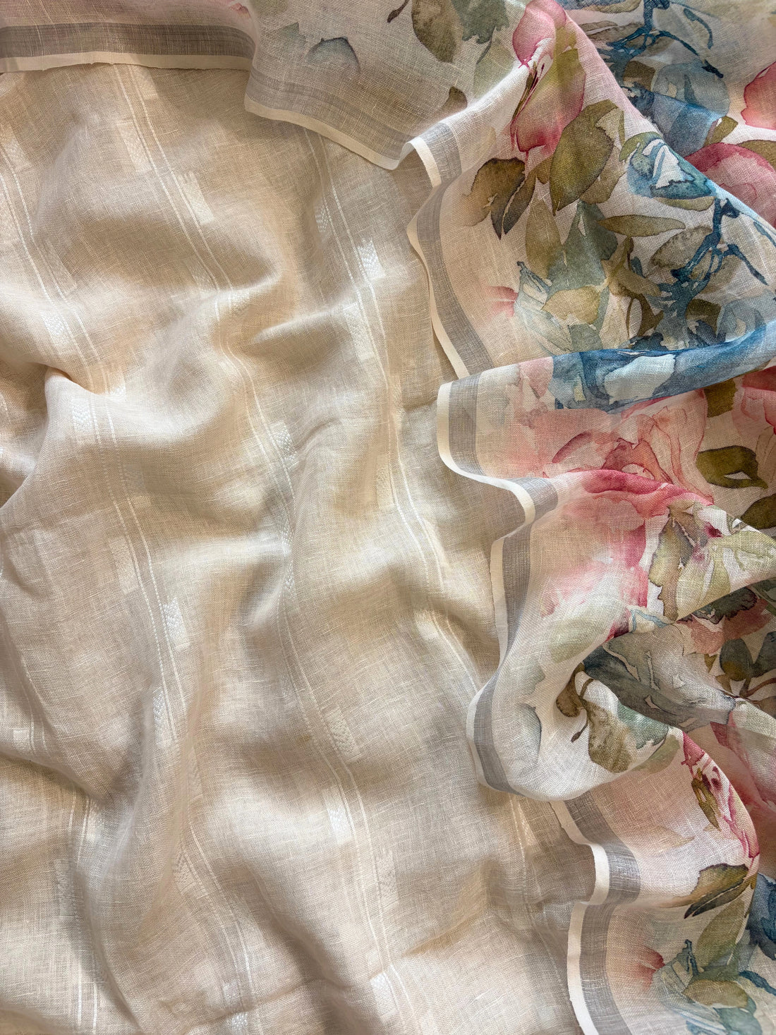 ivory linen suit with minimal white thread embroidery on kurta and floral digital printed dupatta, perfect for summer events and festive daywear.