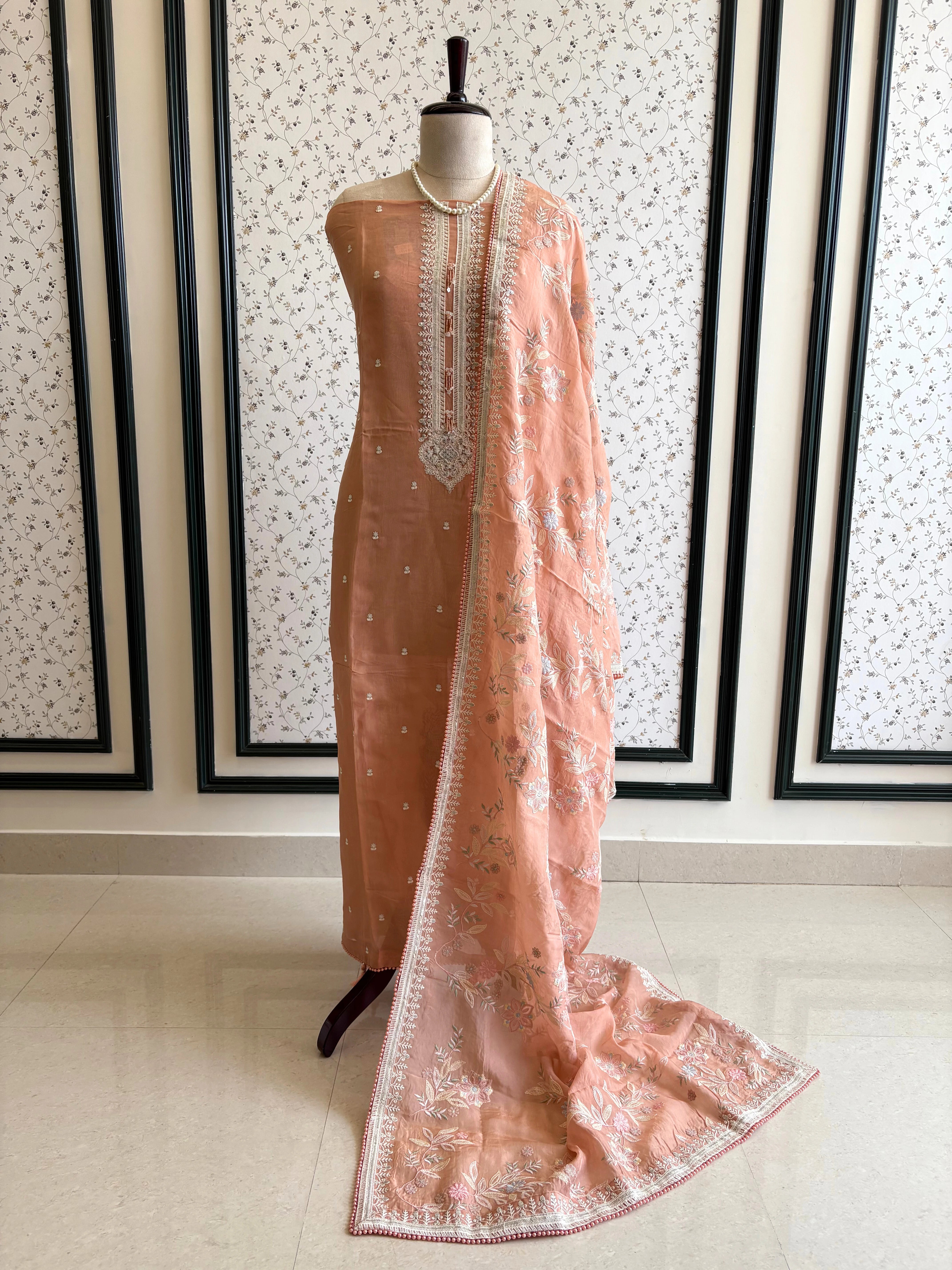 Peach color sheer organza with parsi embroidory.