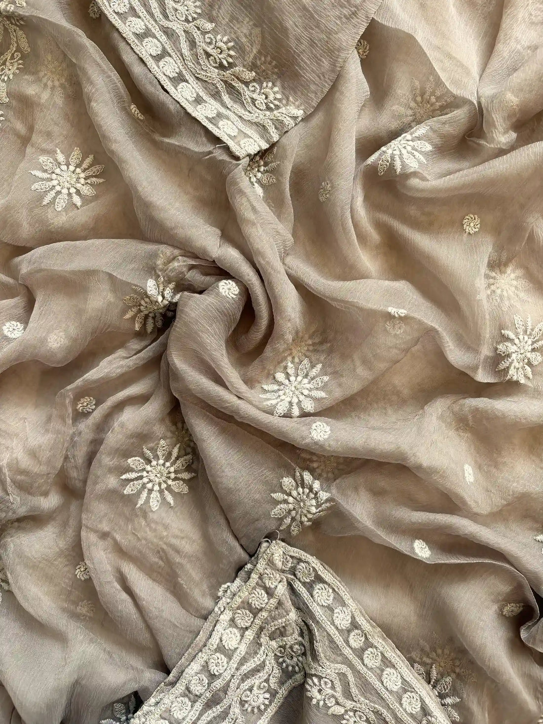 Powder brown georgette suit with moti highlighting and chiffon dupatta – embroidered festive ethnic wear for weddings and formal occasions.