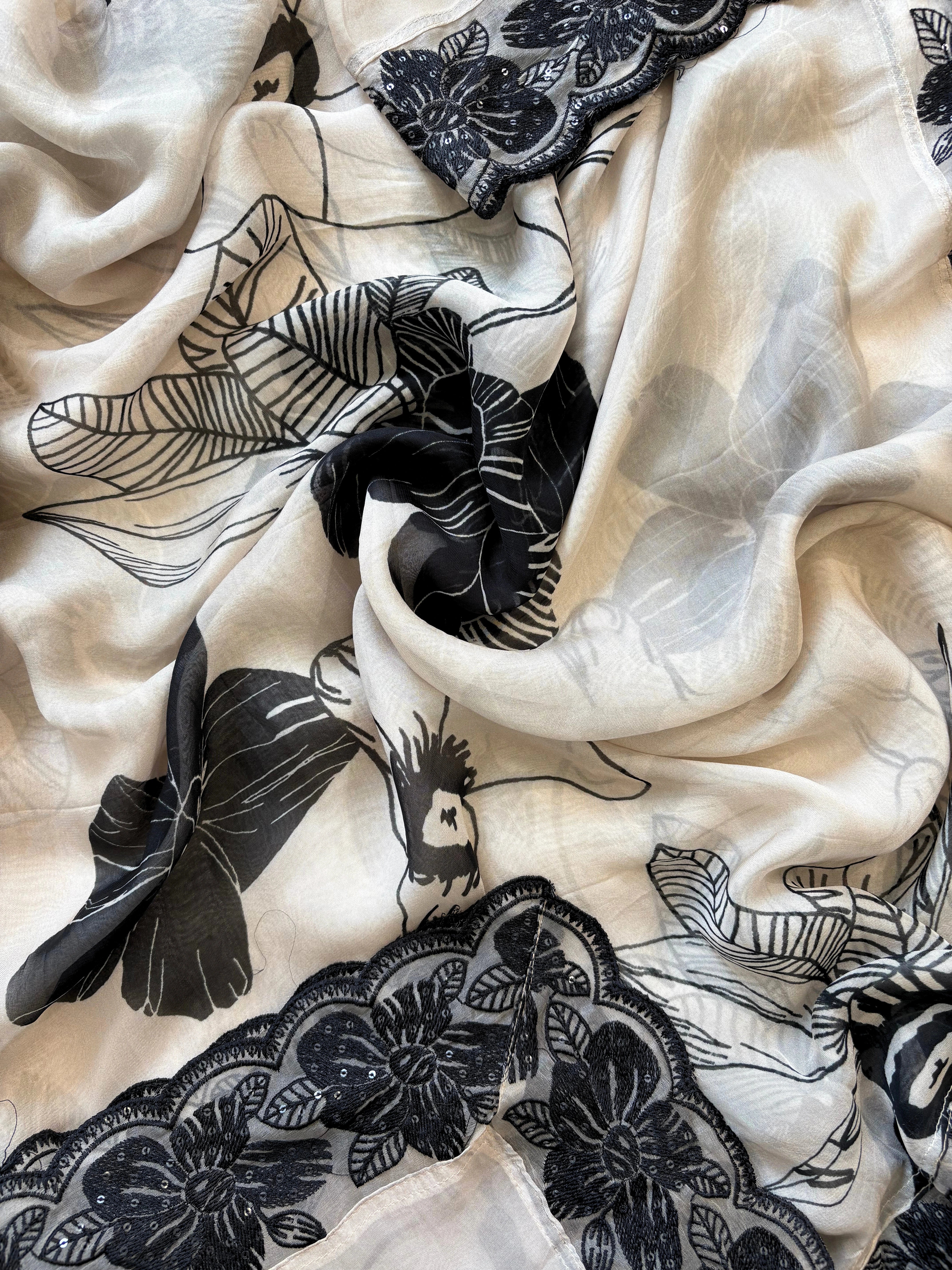 Ivory unstitched cutwork shirt with black applique embroidery and lace detailing, festive ethnic wear fabric