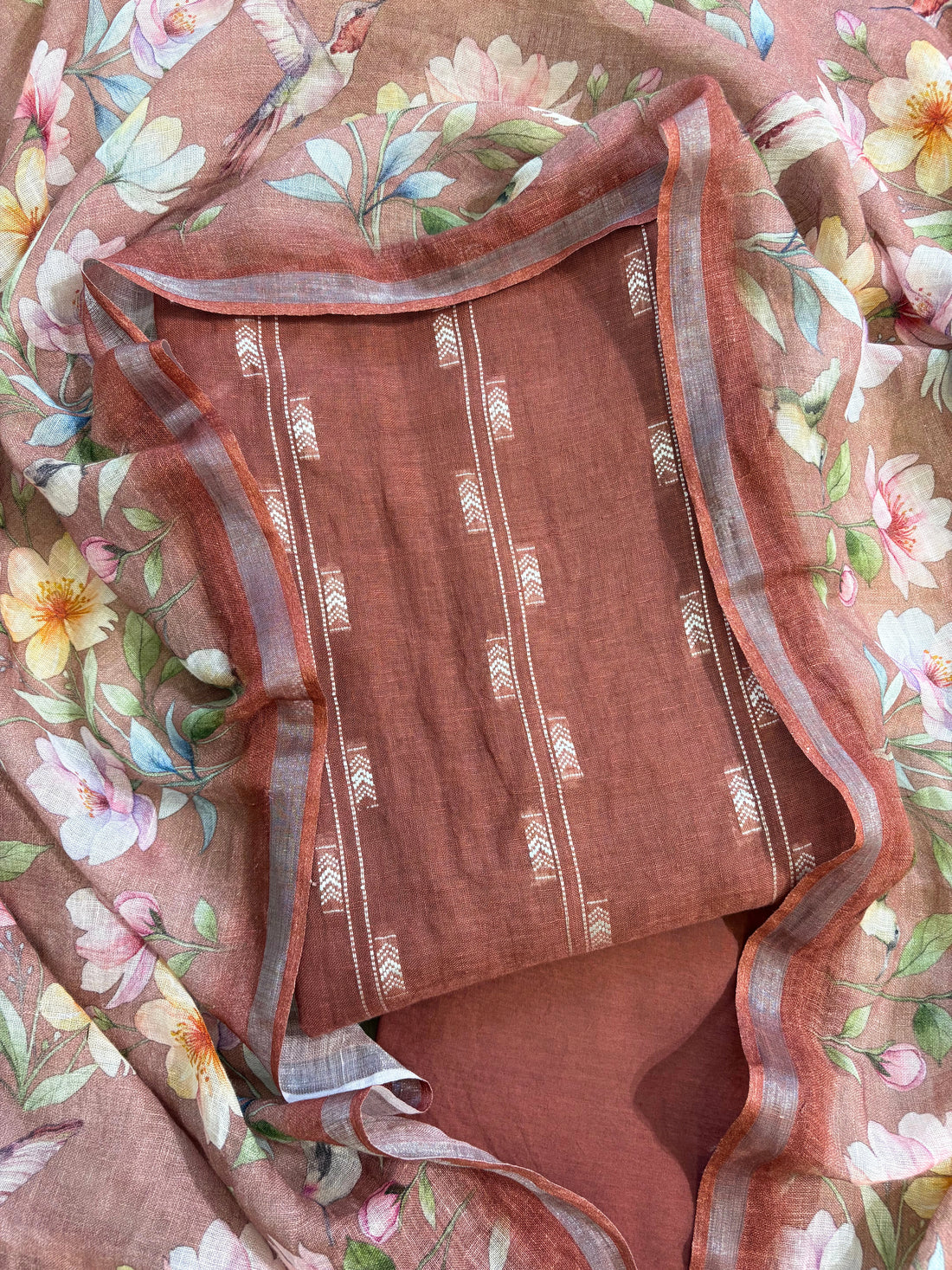 Rosewood linen suit with minimal white thread embroidery on kurta and floral digital printed dupatta, perfect for summer events and festive daywear.