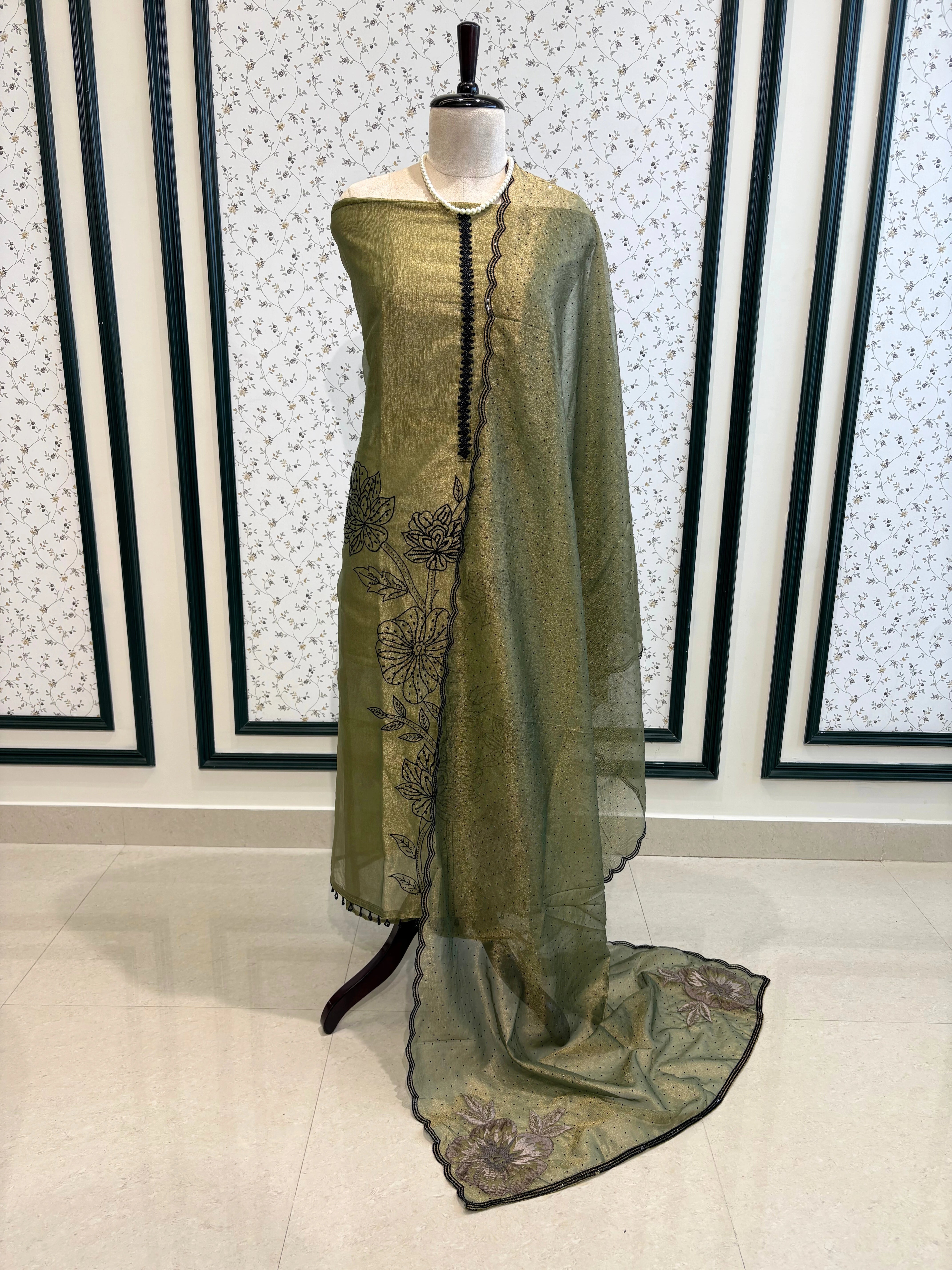 Olive green glass tissue suit with intricate embroidery and organza dupatta – luxury ethnic wear for weddings and festive occasions.