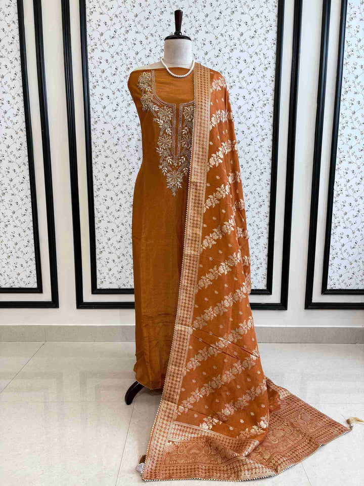 satin organza orange unstitched suit with zardozi neckline