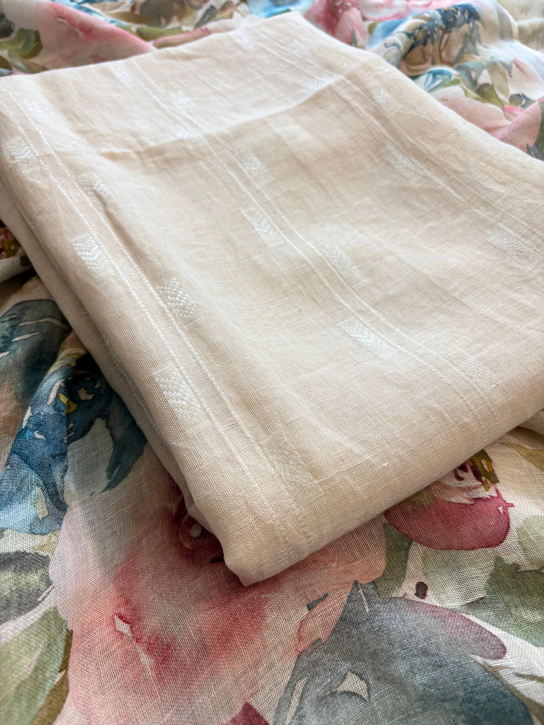 ivory linen suit with minimal white thread embroidery on kurta and floral digital printed dupatta, perfect for summer events and festive daywear.