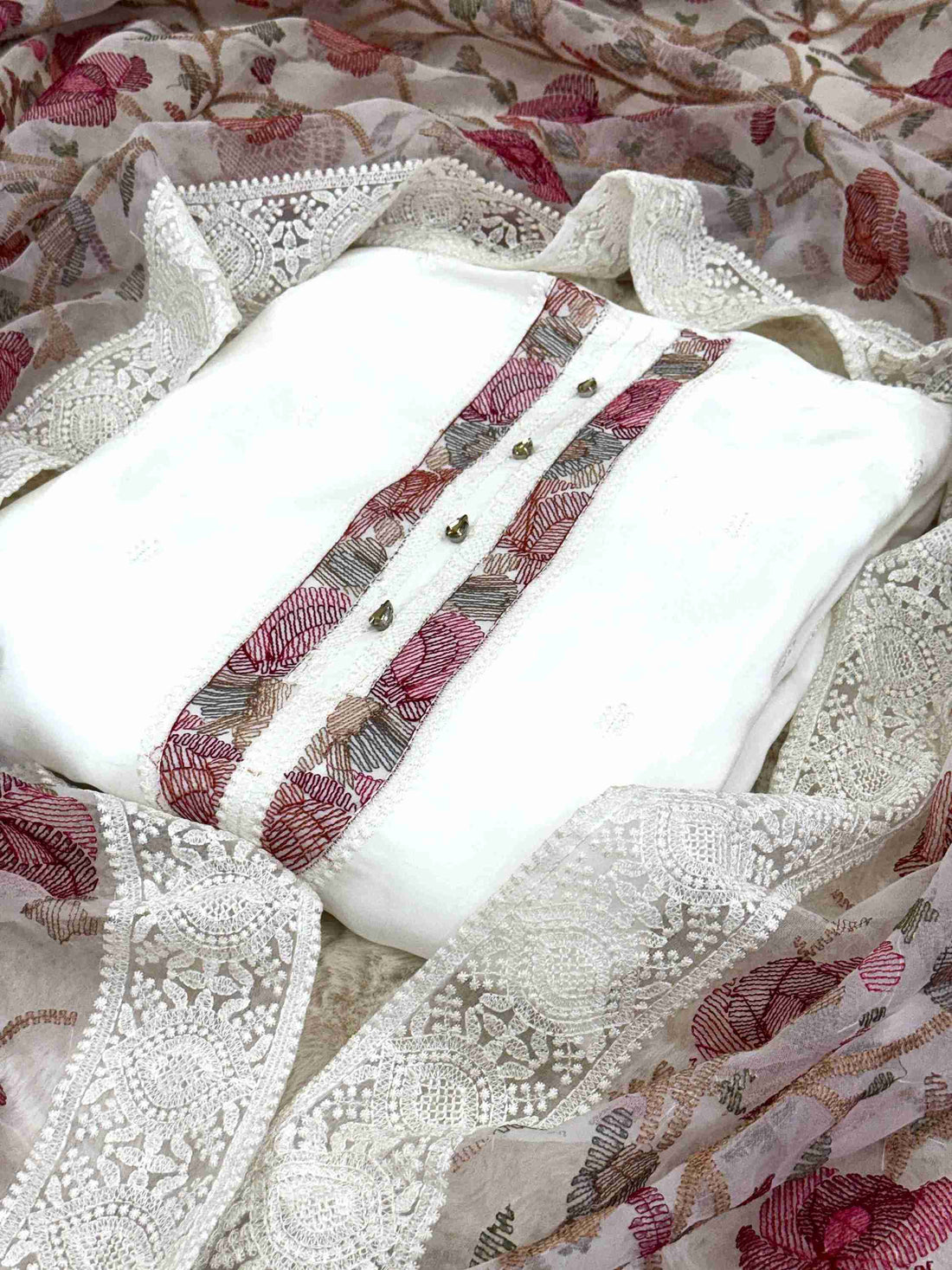 white crepe unstitched suit with jaal work dupatta