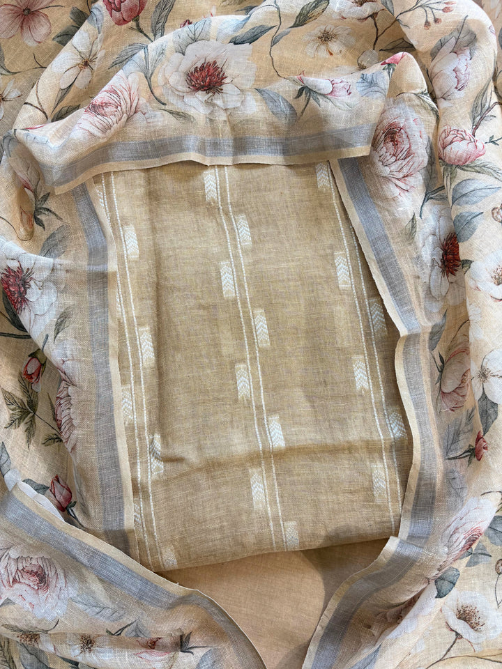 beige linen suit with minimal white thread embroidery on kurta and floral digital printed dupatta, perfect for summer events and festive daywear.