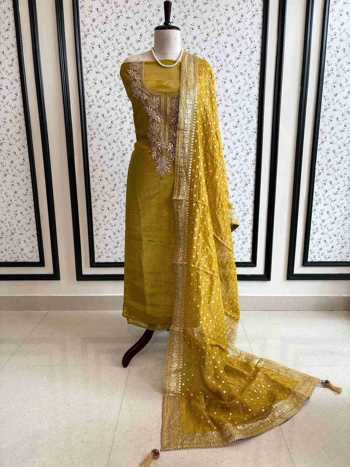 satin organza yellow unstitched suit with zardozi neckline