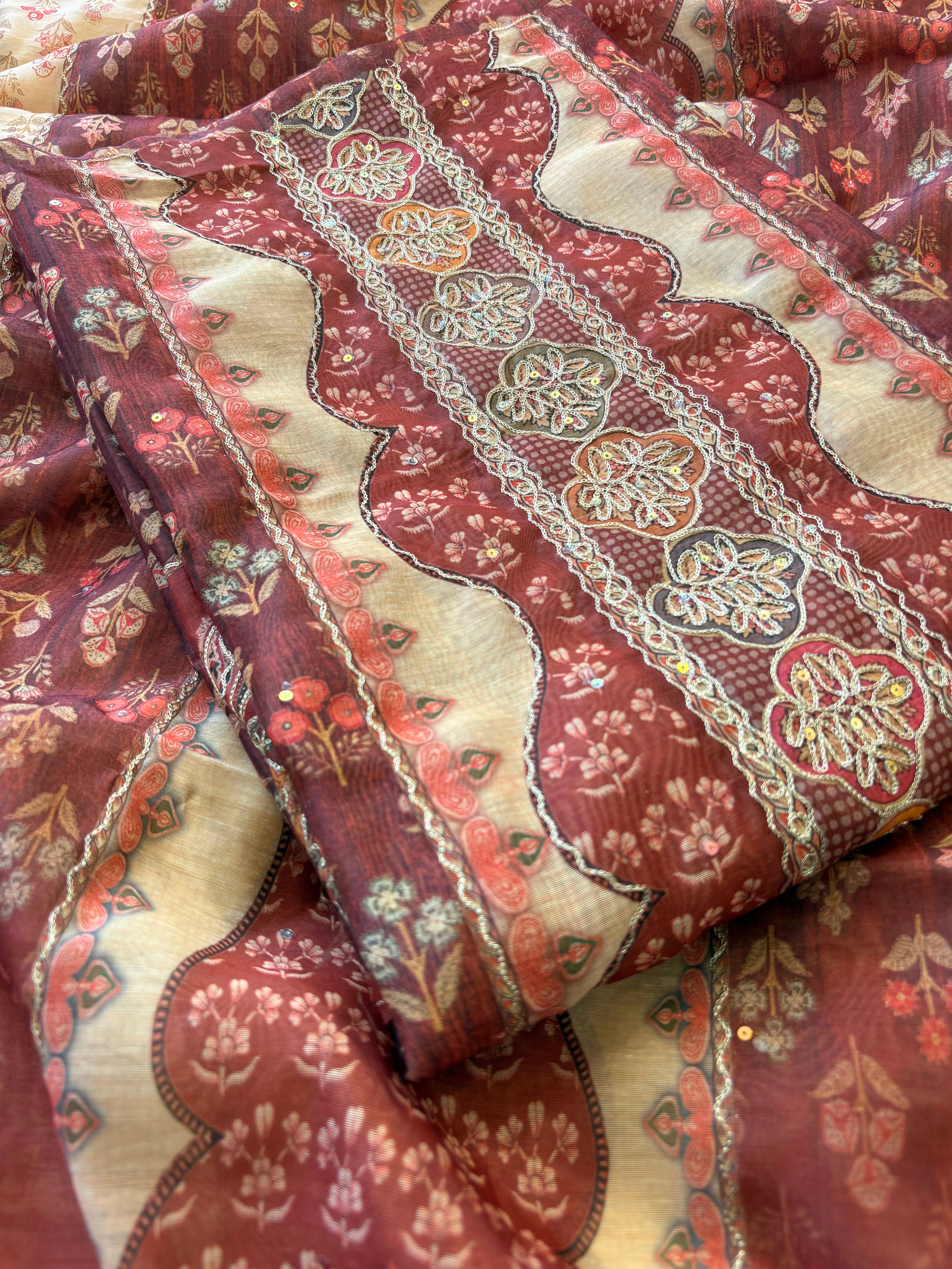 Rust red chanderi suit with golden weave and printed chanderi dupatta featuring tassel edging.