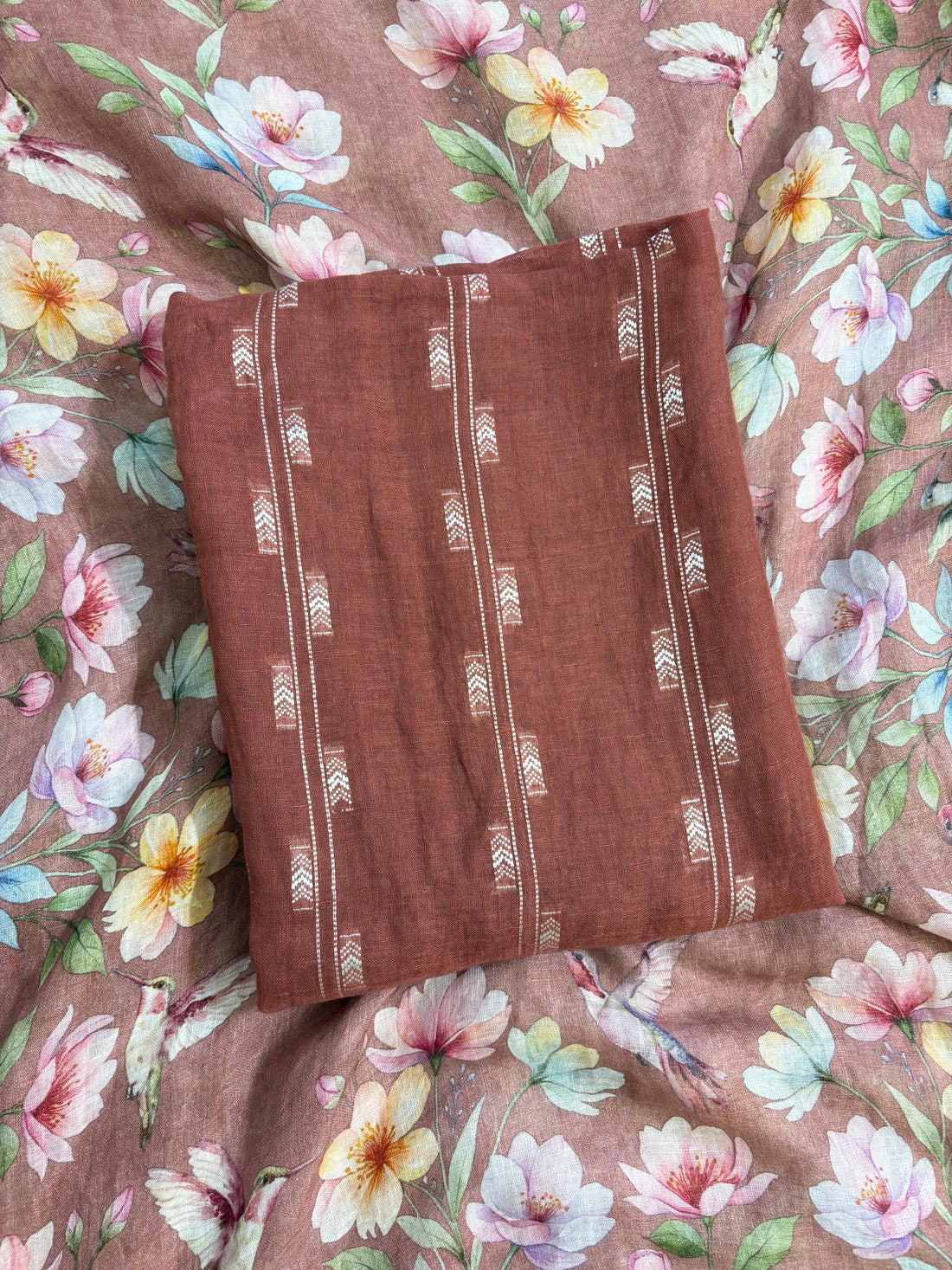 Rosewood linen suit with minimal white thread embroidery on kurta and floral digital printed dupatta, perfect for summer events and festive daywear.