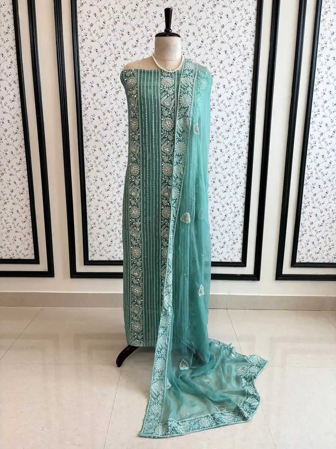 aqua green party wear chikankari unstiched suit with moti and sequence embellishments