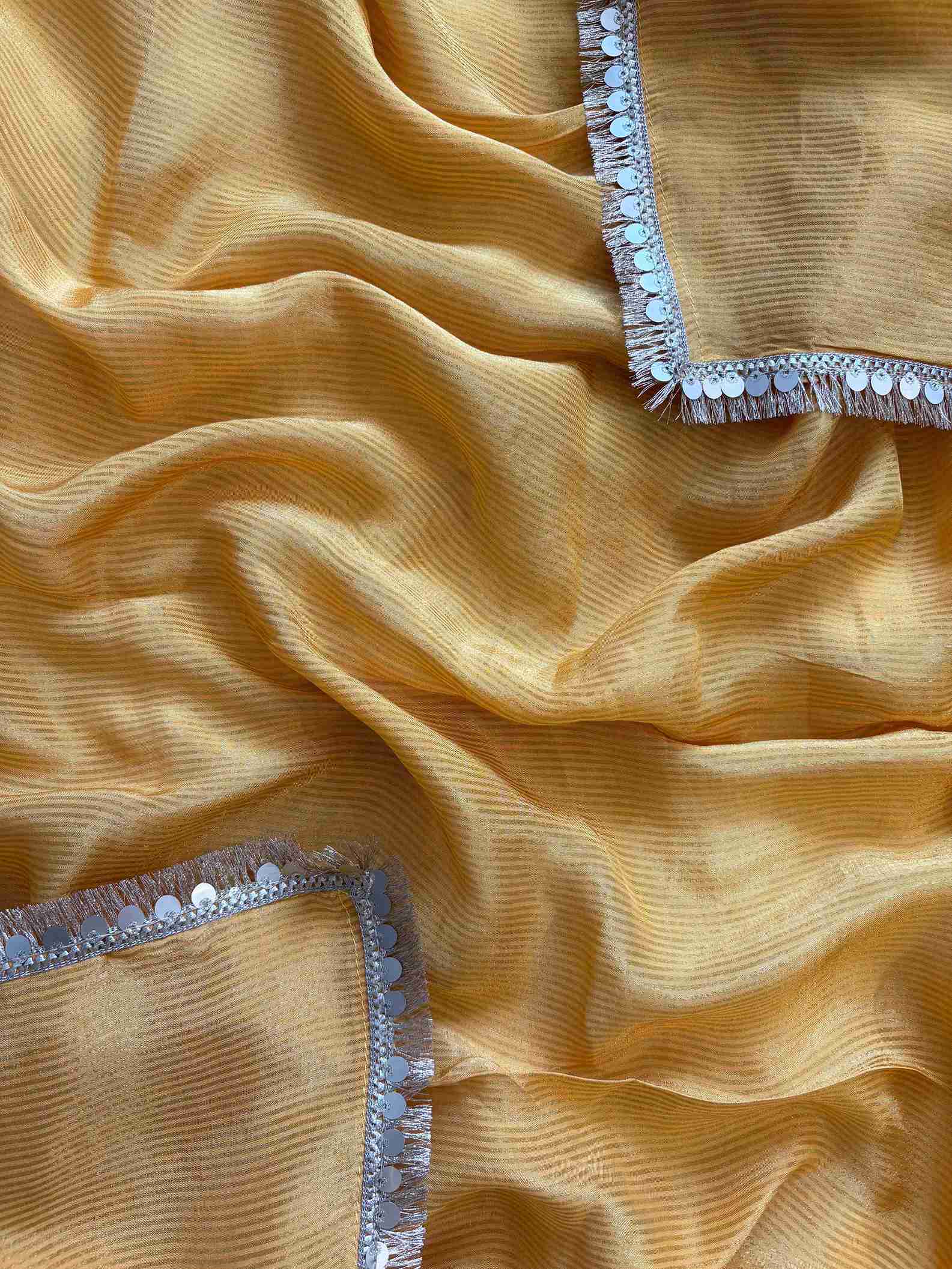 Shimmer Tissue unstitched suit in Yellow color- The Zareesh