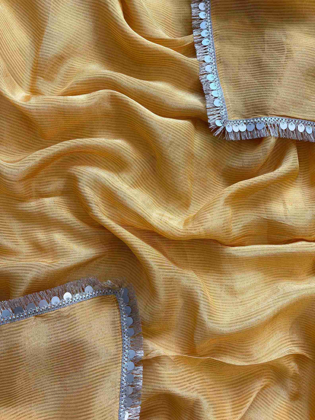 Shimmer Tissue unstitched suit in Yellow color- The Zareesh