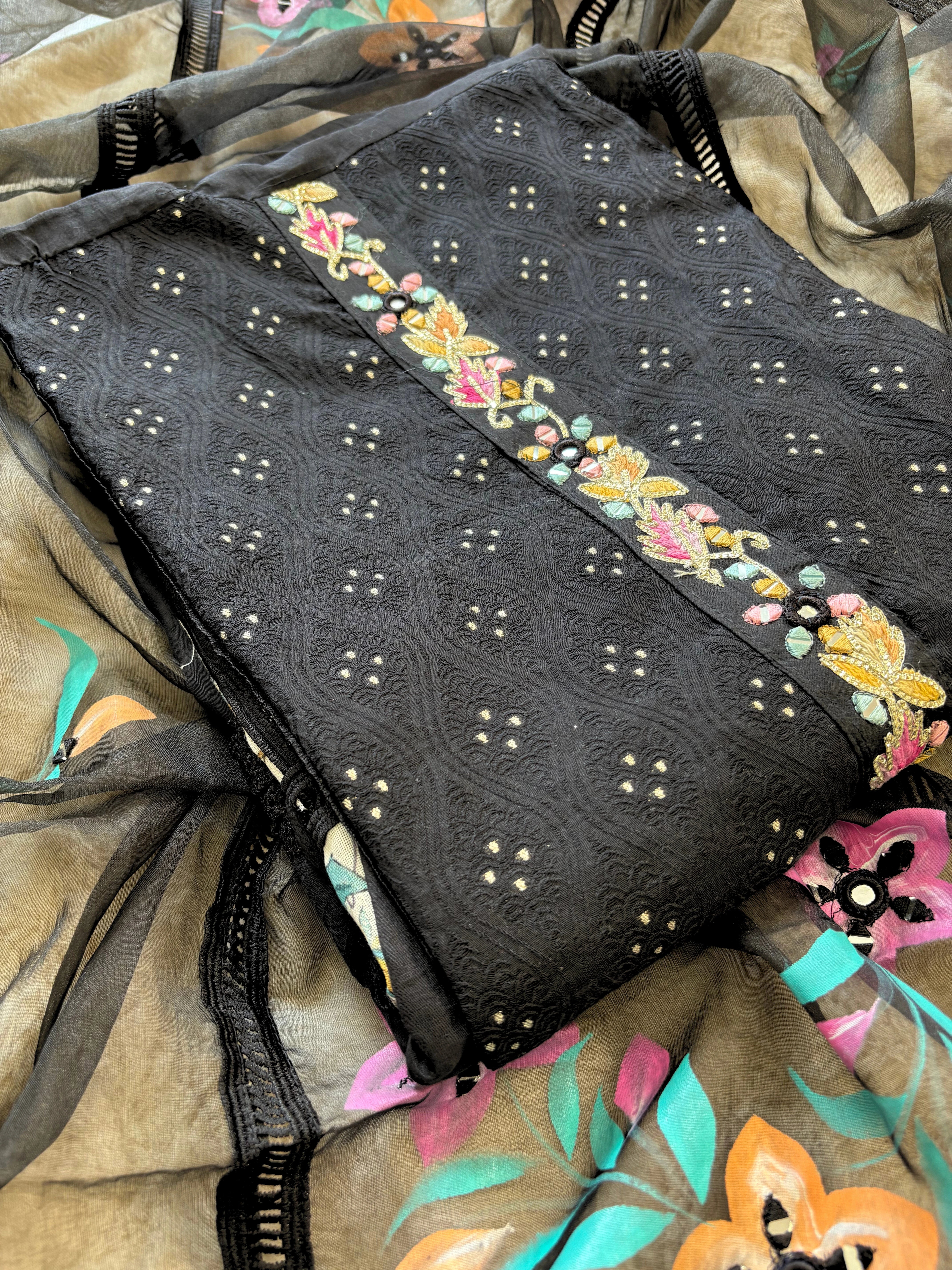 black linen suit with embroidered detailing and hand-painted floral organza dupatta, finished with lace border – unstitched ethnic wear set