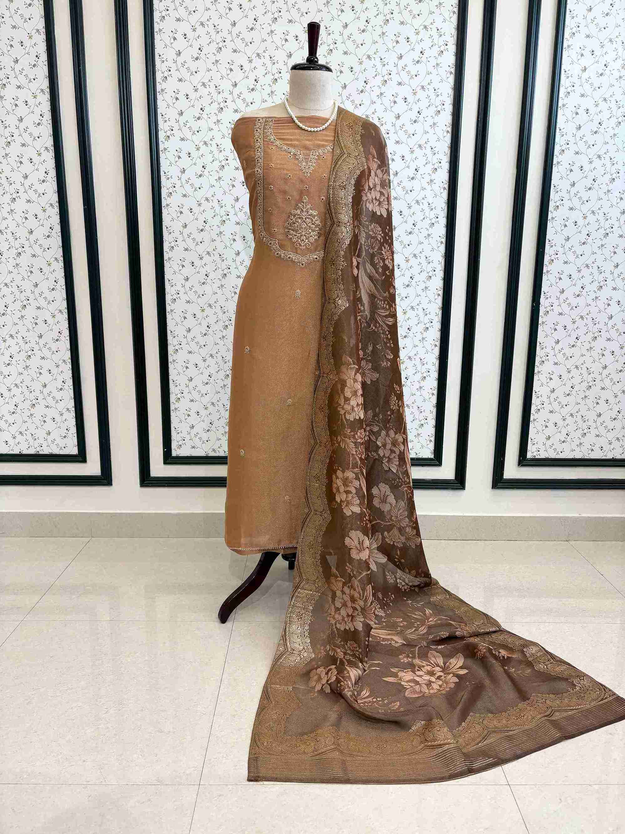 Gold organza suit set displayed on mannequin – The Zareesh