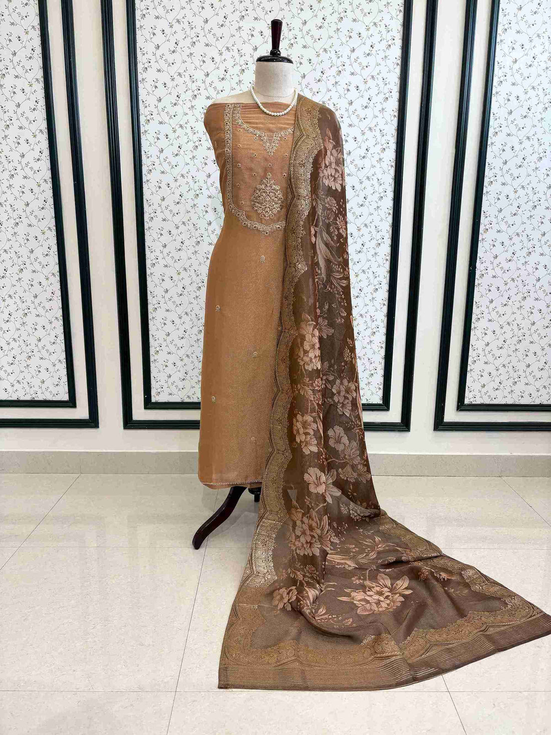 Gold organza suit set displayed on mannequin – The Zareesh