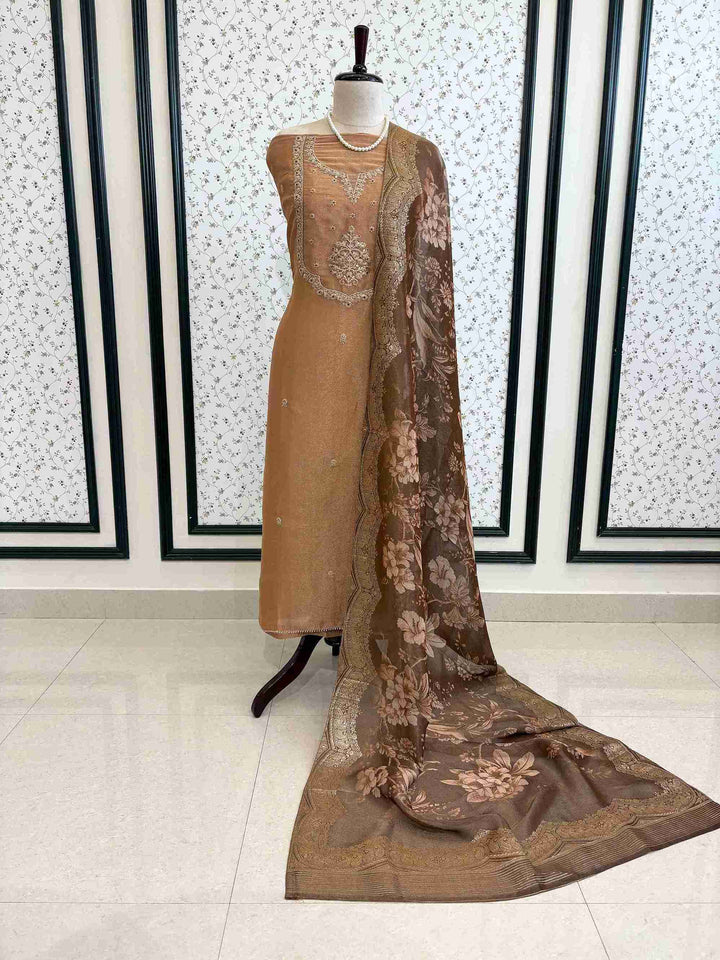 Gold organza suit set displayed on mannequin – The Zareesh