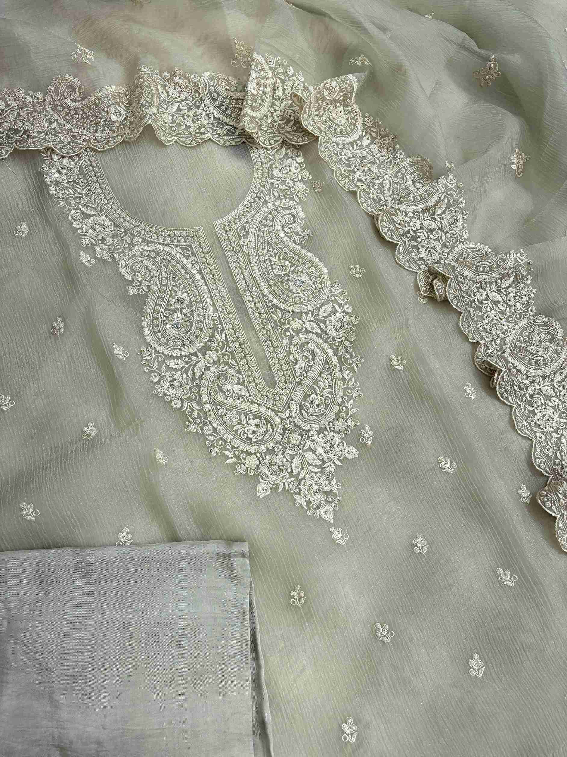 Complete Green marble chiffon unstitched suit flat lay set with shirt, dupatta, and opada silk bottom
