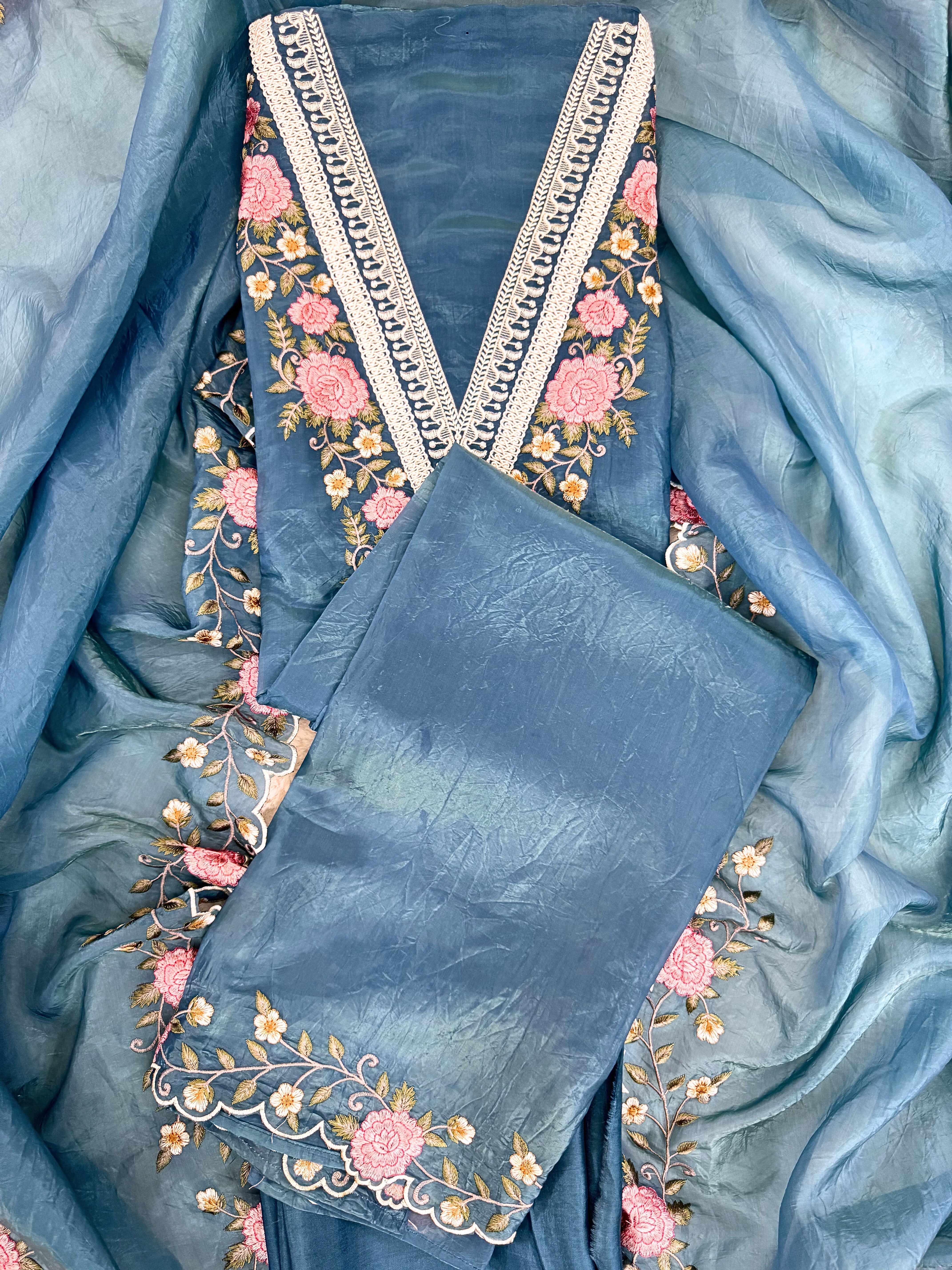 Tissue unstitched suit with pink and ivory floral embroidery on neck