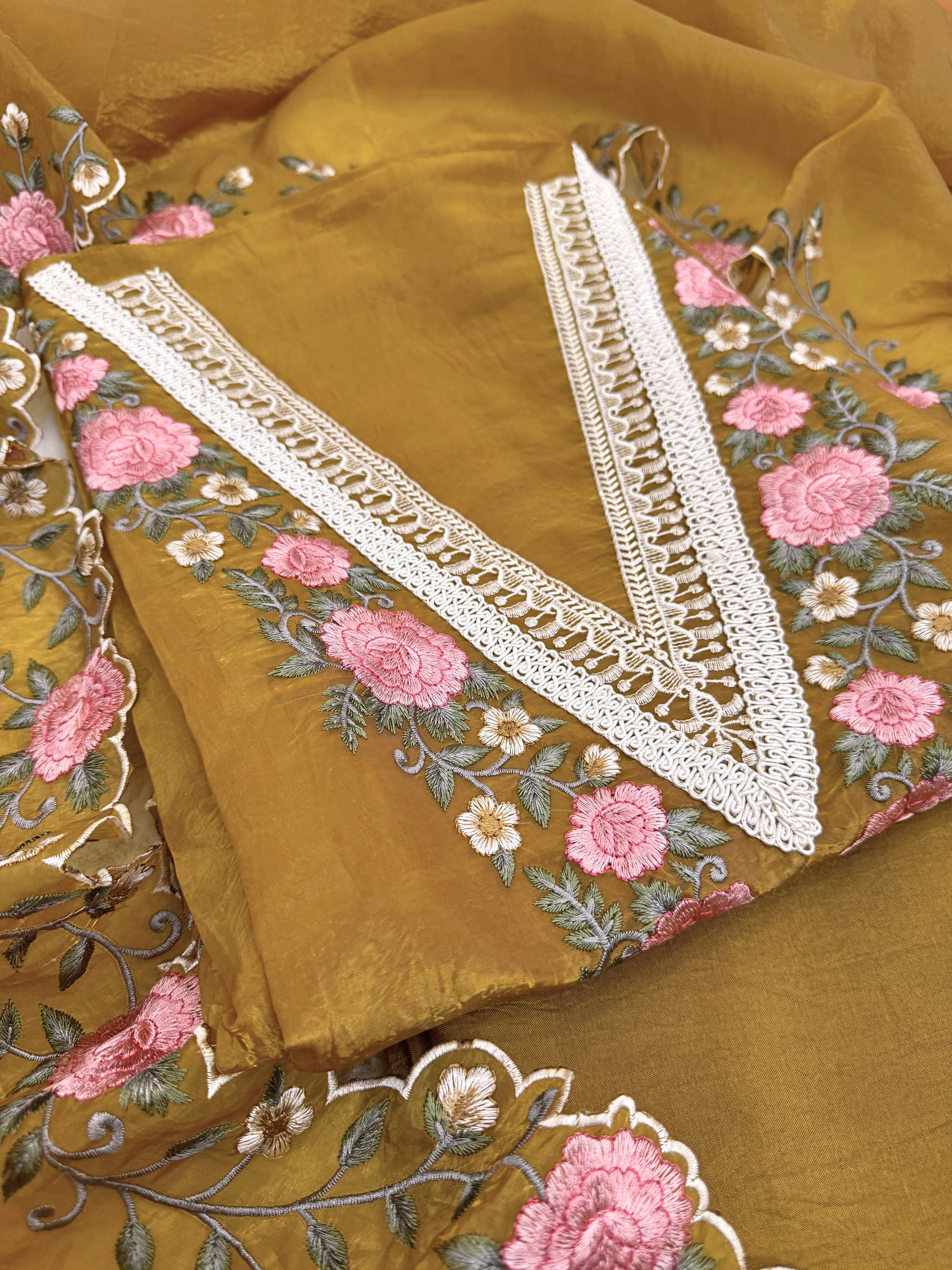 Tissue unstitched suit with pink and ivory floral embroidery on neck