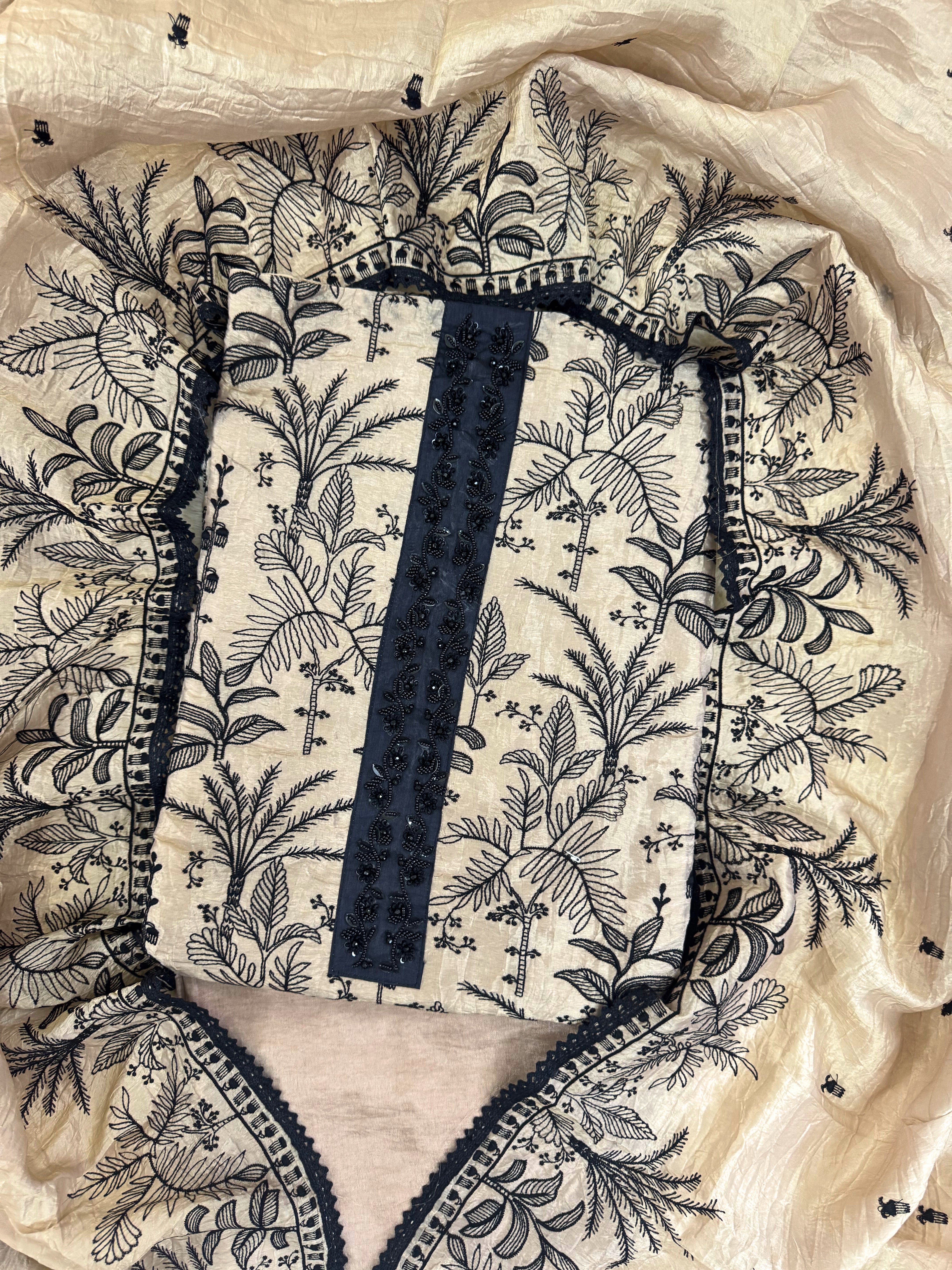 Whispers of Nature: Beige Tissue Suit with Black Embroidery