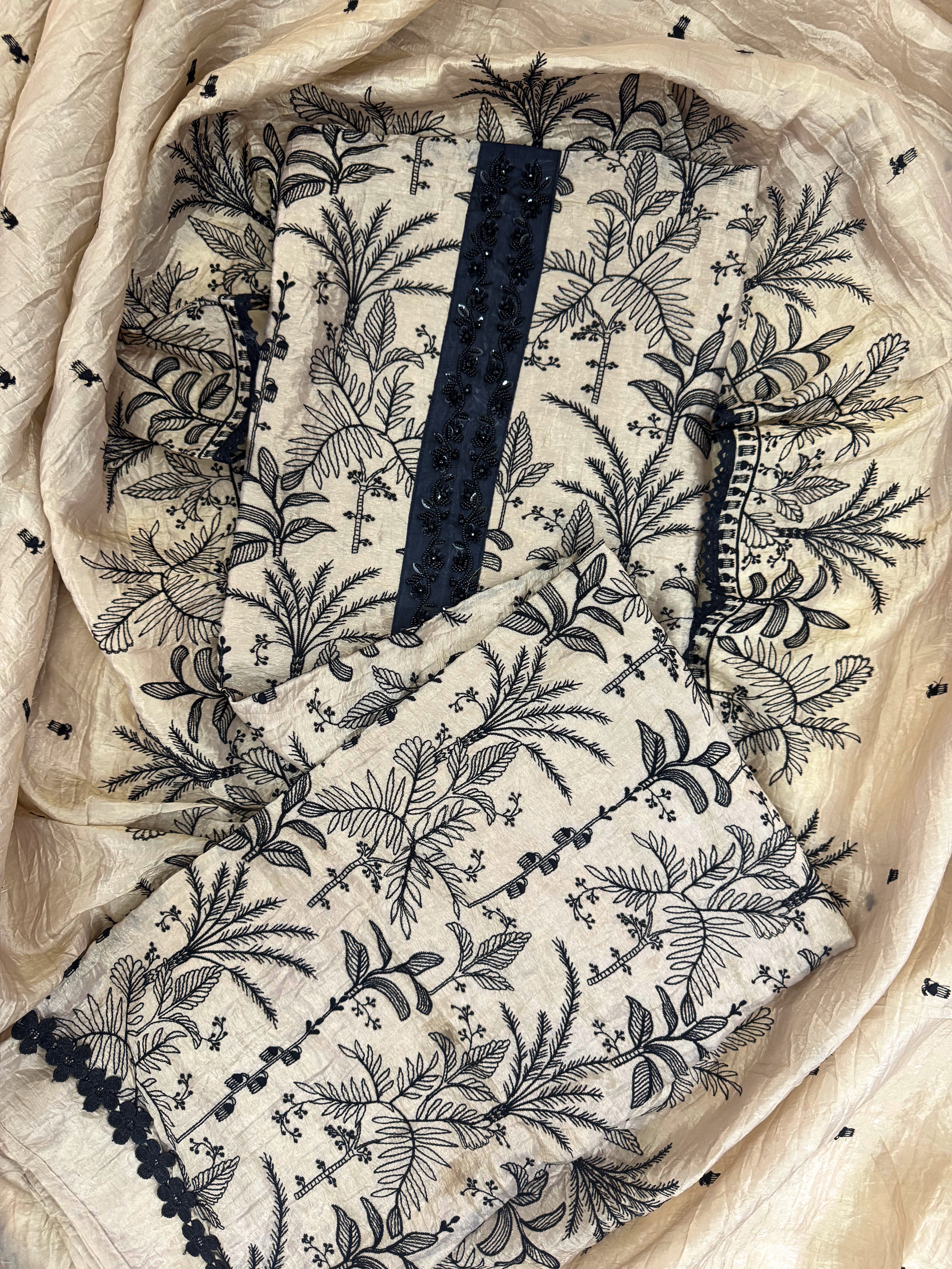 Whispers of Nature: Beige Tissue Suit with Black Embroidery