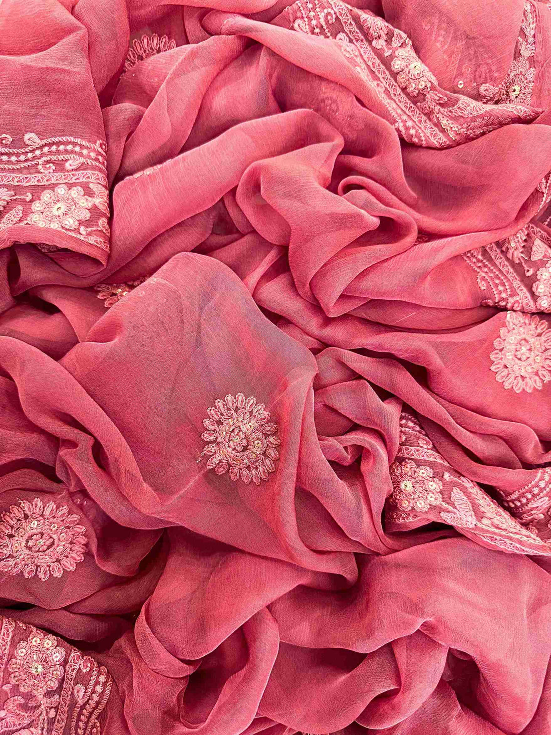 Chikankari unstitched suits on georgette fabric in red color with moti and sequence highlighting