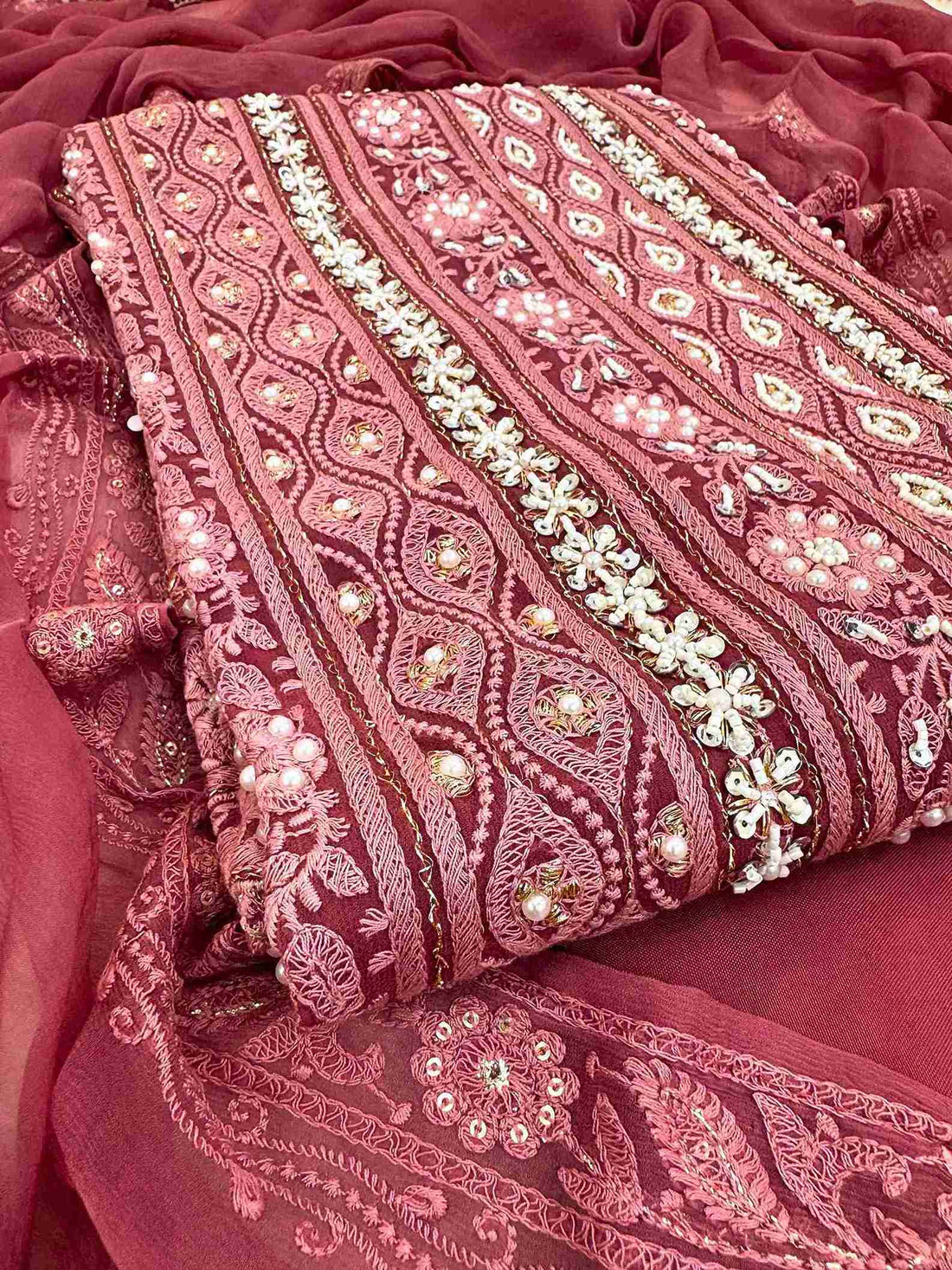 Chikankari unstitched suits on georgette fabric in red color with moti and sequence highlighting