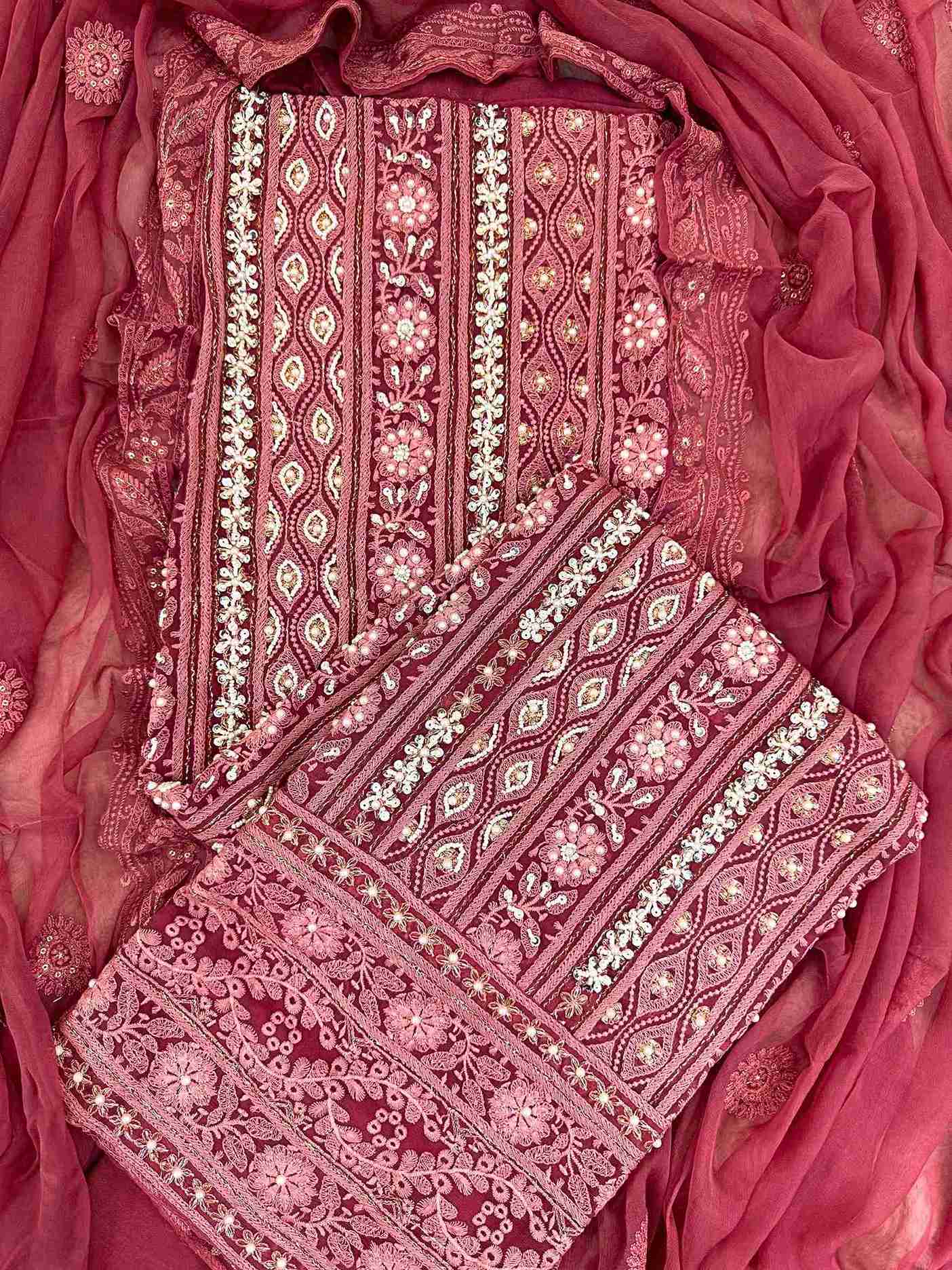 Chikankari unstitched suits on georgette fabric in red color with moti and sequence highlighting