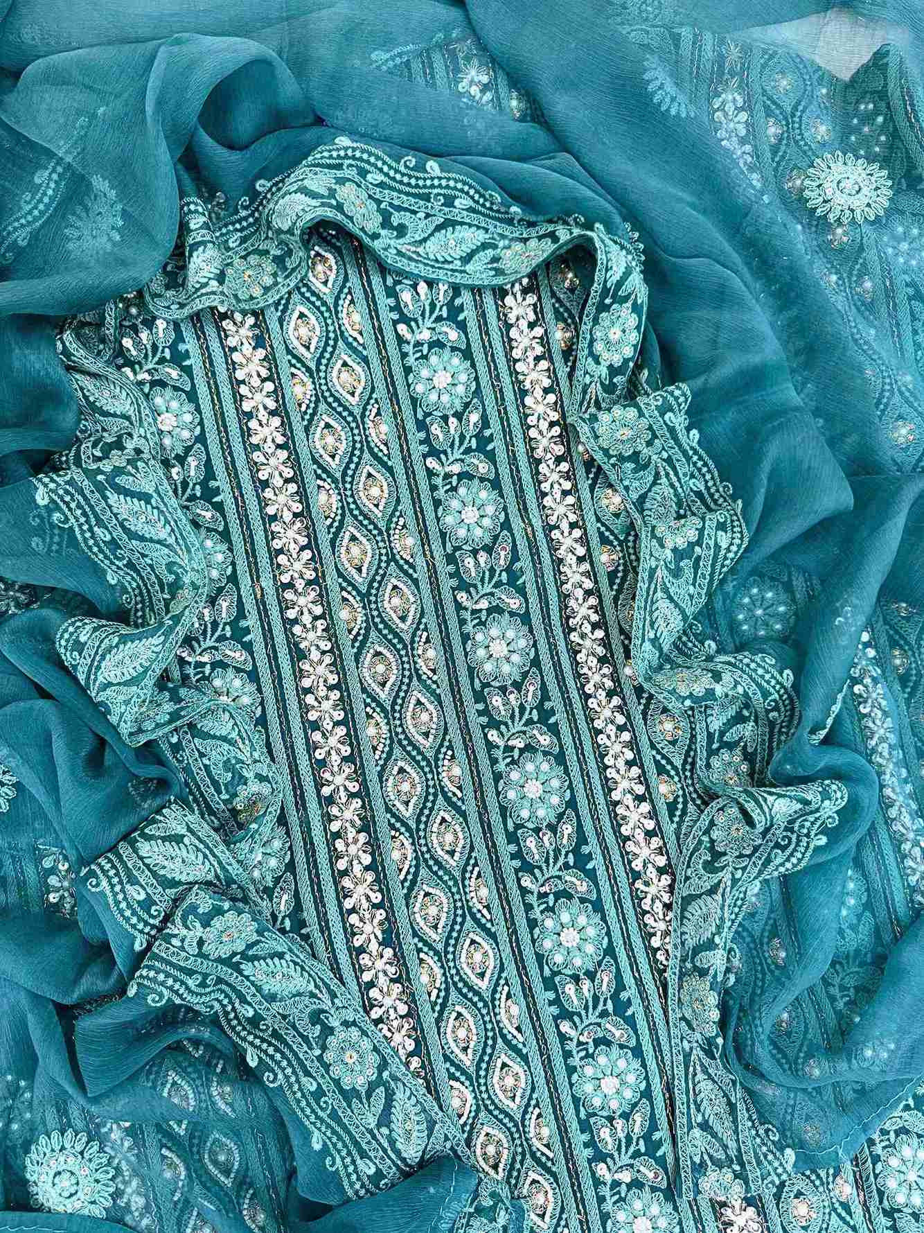 Chikankari unstitched suits on georgette fabric in teal color with moti and sequence highlighting
