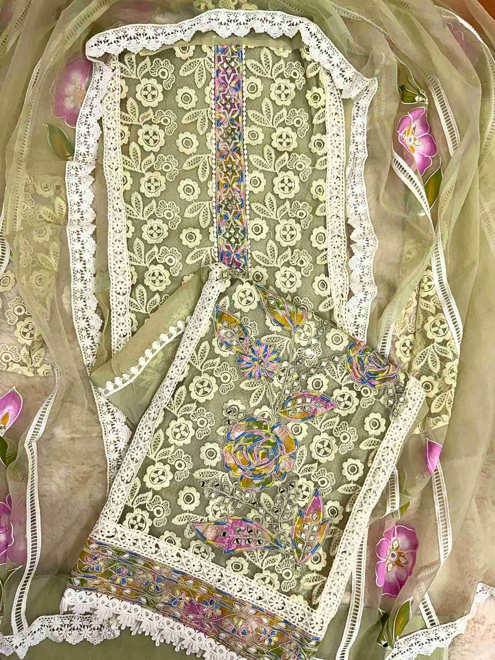 party wear unstitched suits for women on crotia work net and hand painted dupatta