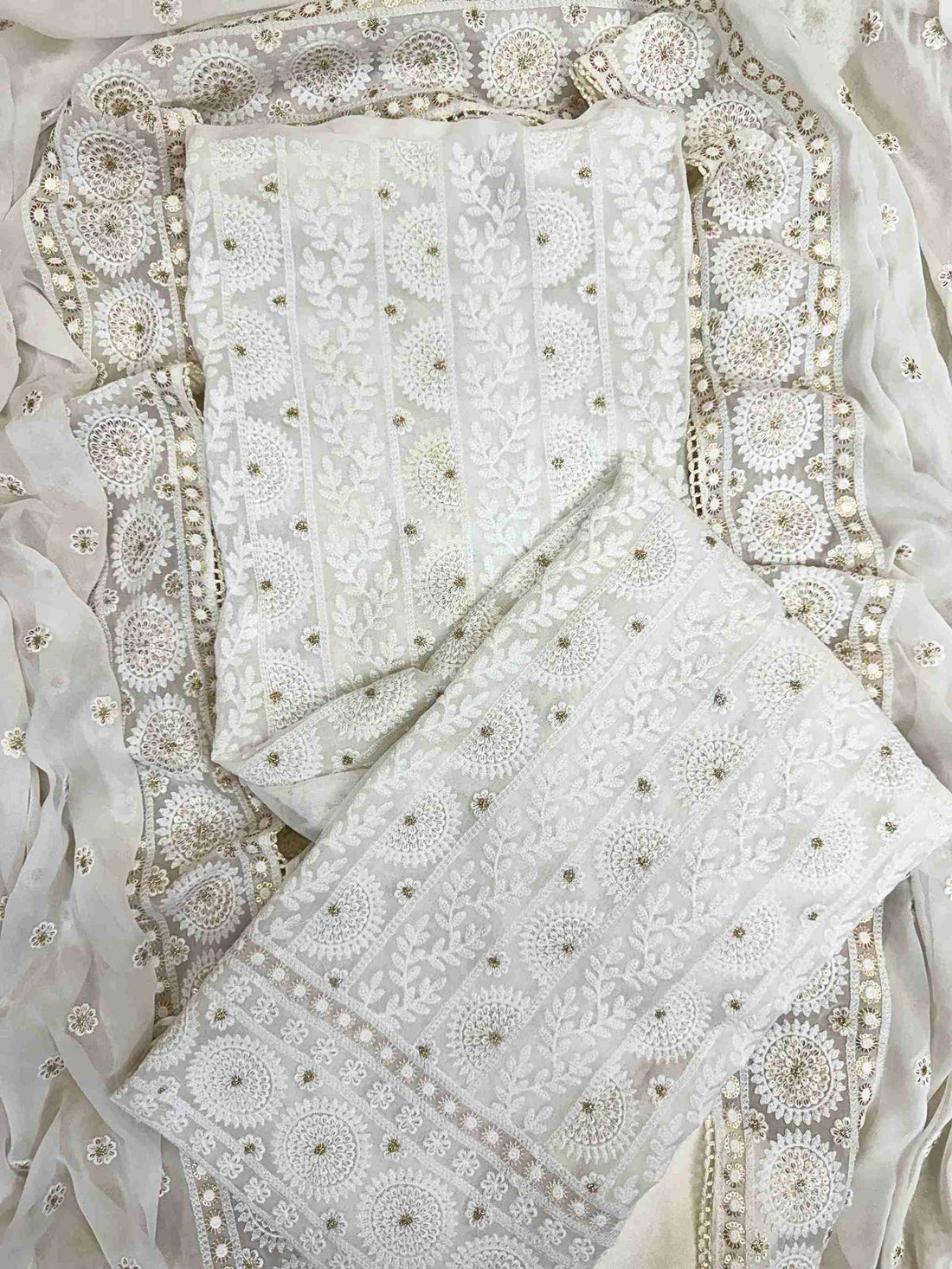 chikankari unstitched suit for women in white color