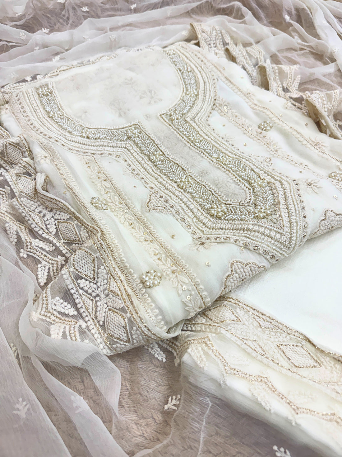 Ivory Radiance: Hand-Embroidered Suit with Pearl & Zari Highlights