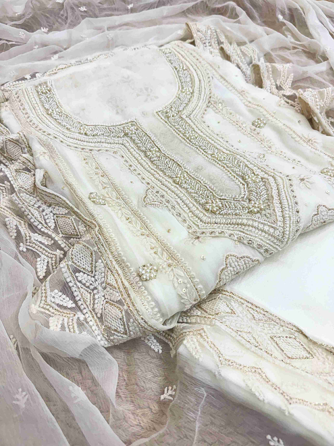 chikankari unstitched suit for women in white color