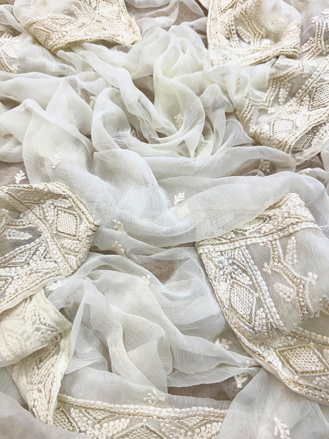 Ivory Radiance: Hand-Embroidered Suit with Pearl & Zari Highlights