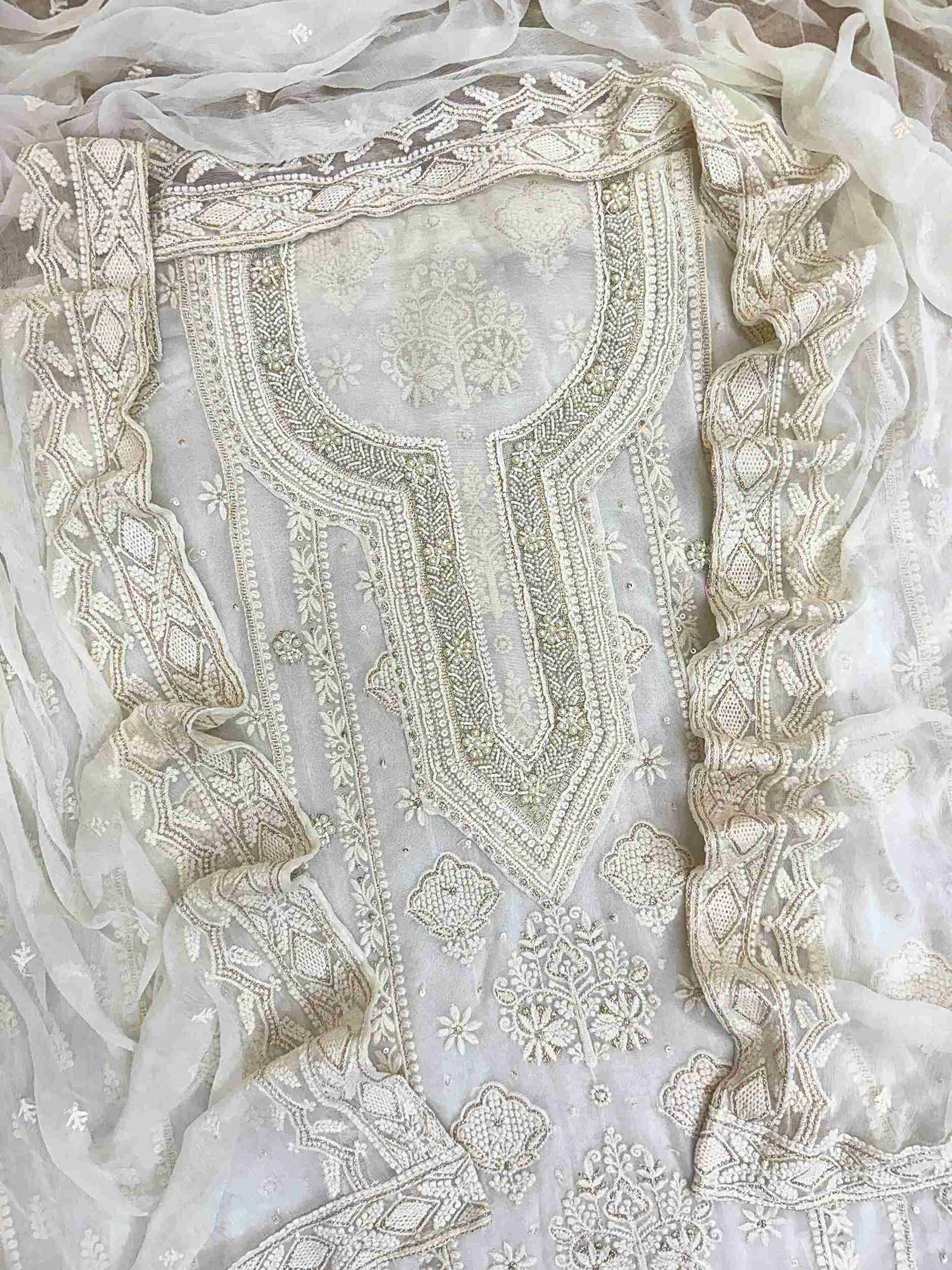 chikankari unstitched suit for women in white color