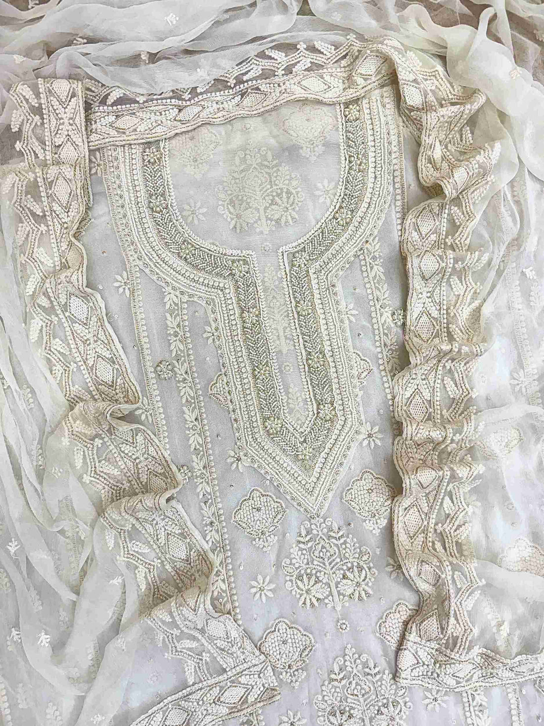 chikankari unstitched suit for women in white color
