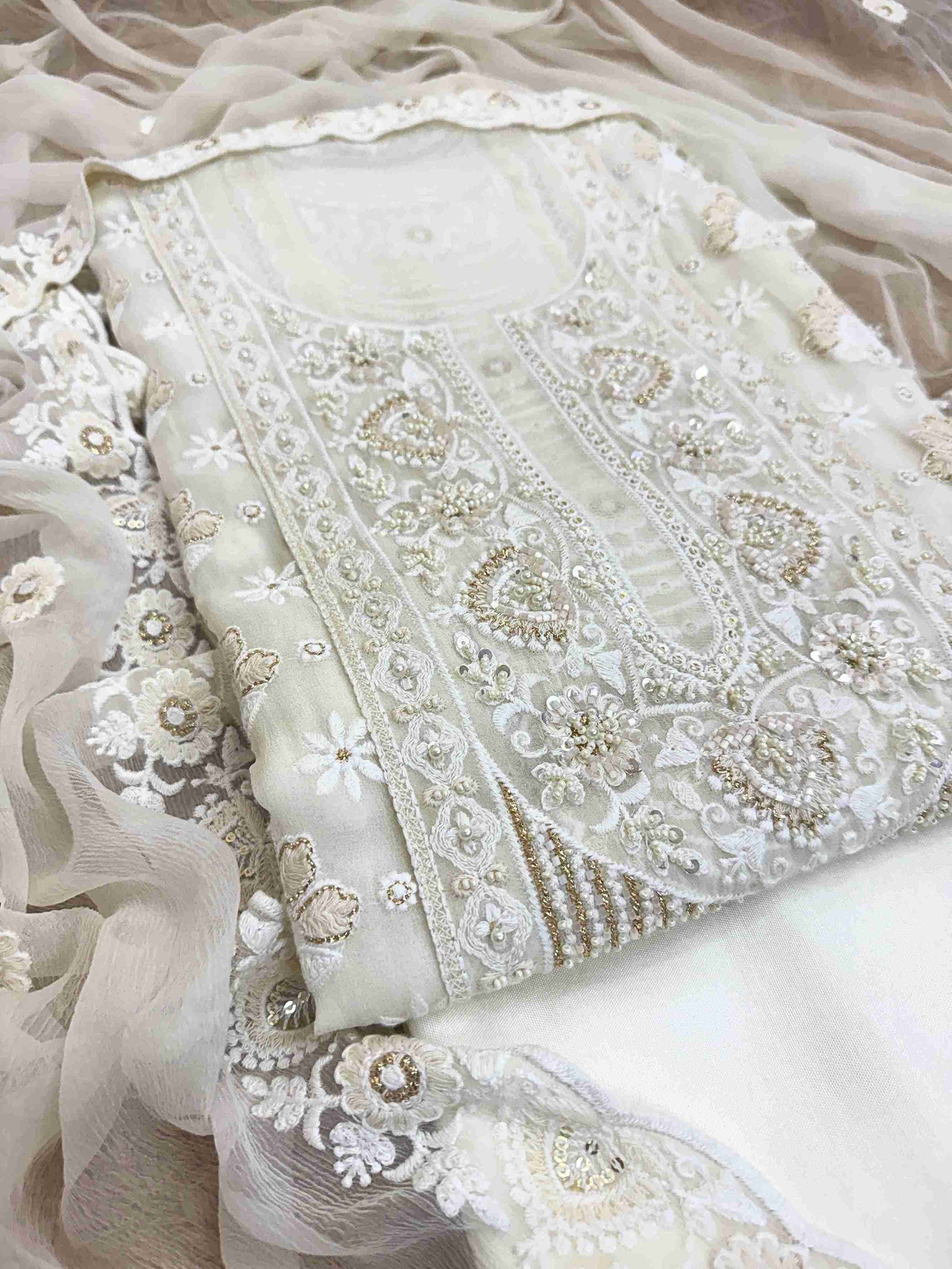 georgette chikankari unstitched suit in white color or women