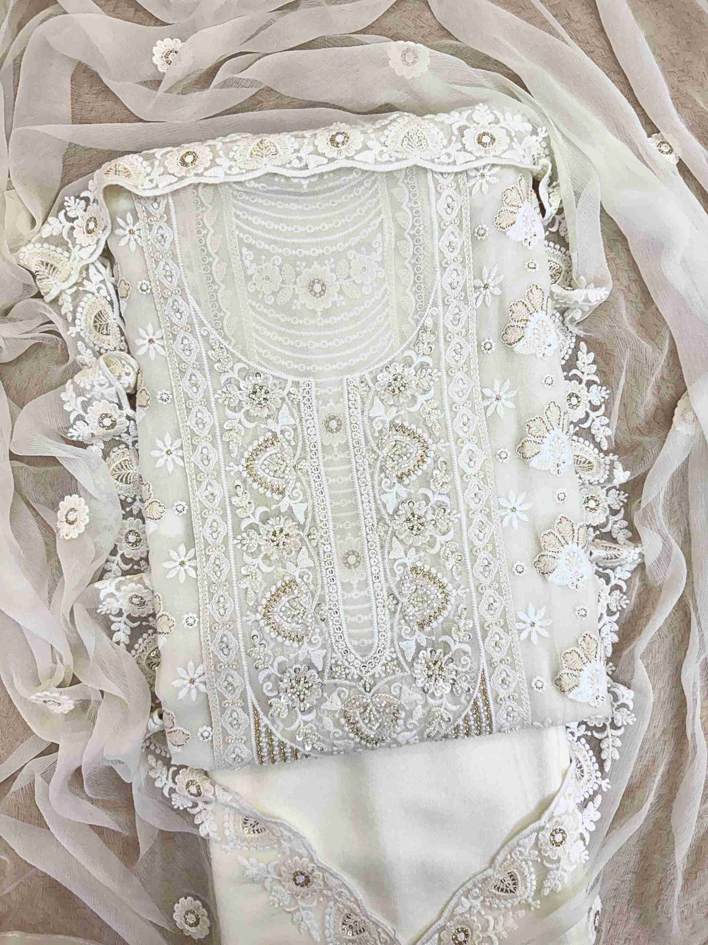 georgette chikankari unstitched suit in white color or women