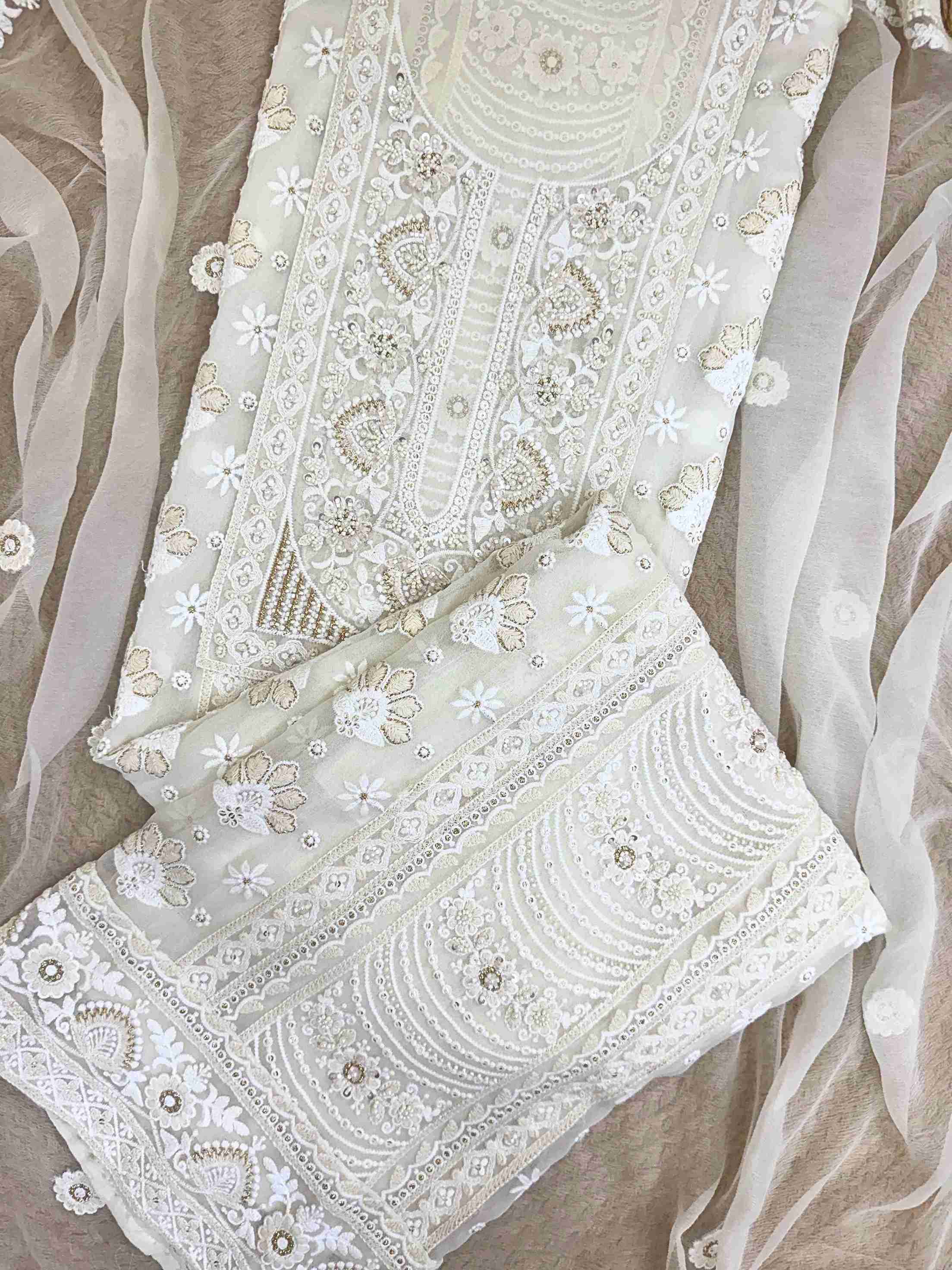 georgette chikankari unstitched suit in white color or women