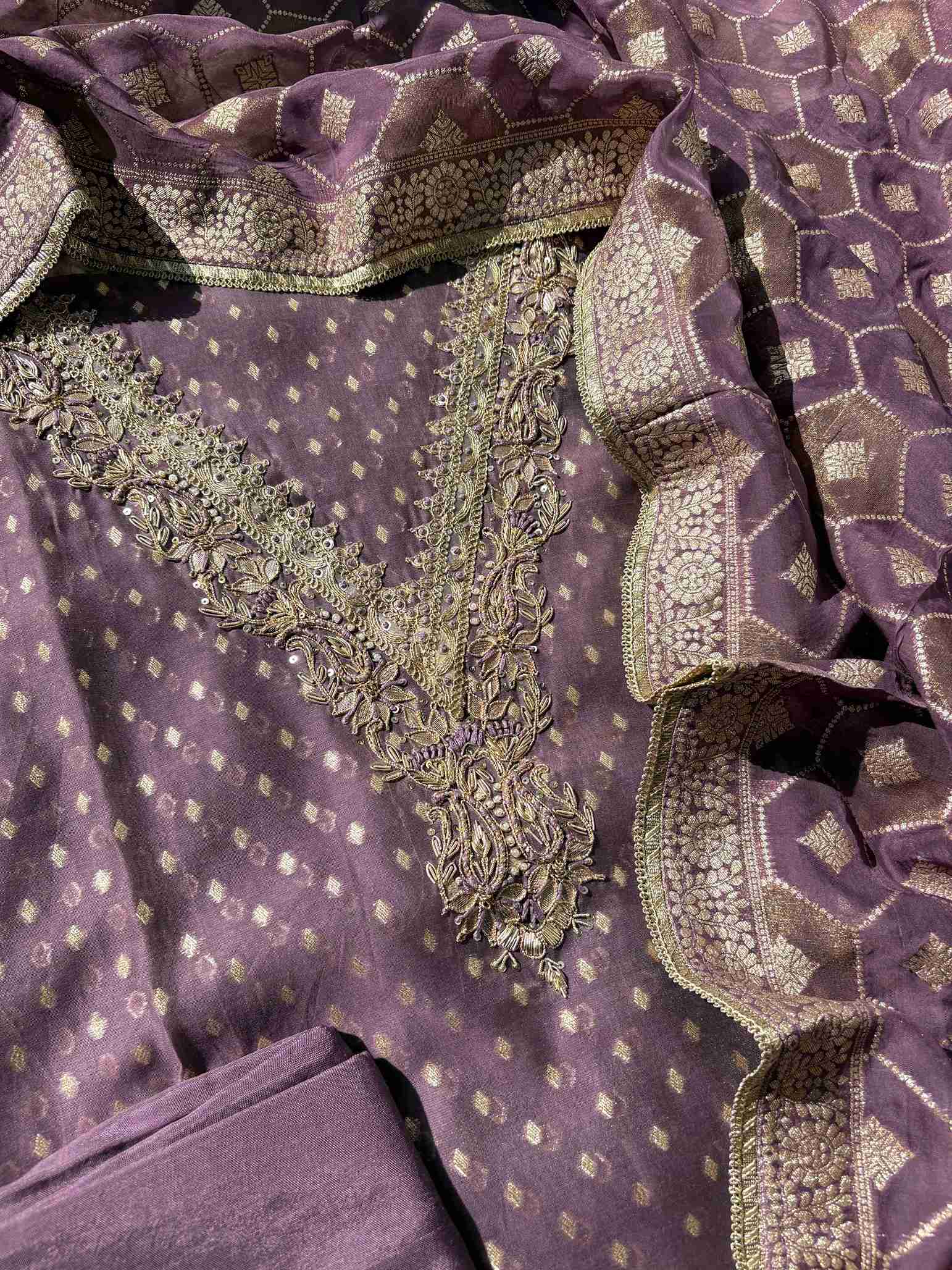 Lavender unstitched organza suit paired with rich Banarasi dupatta