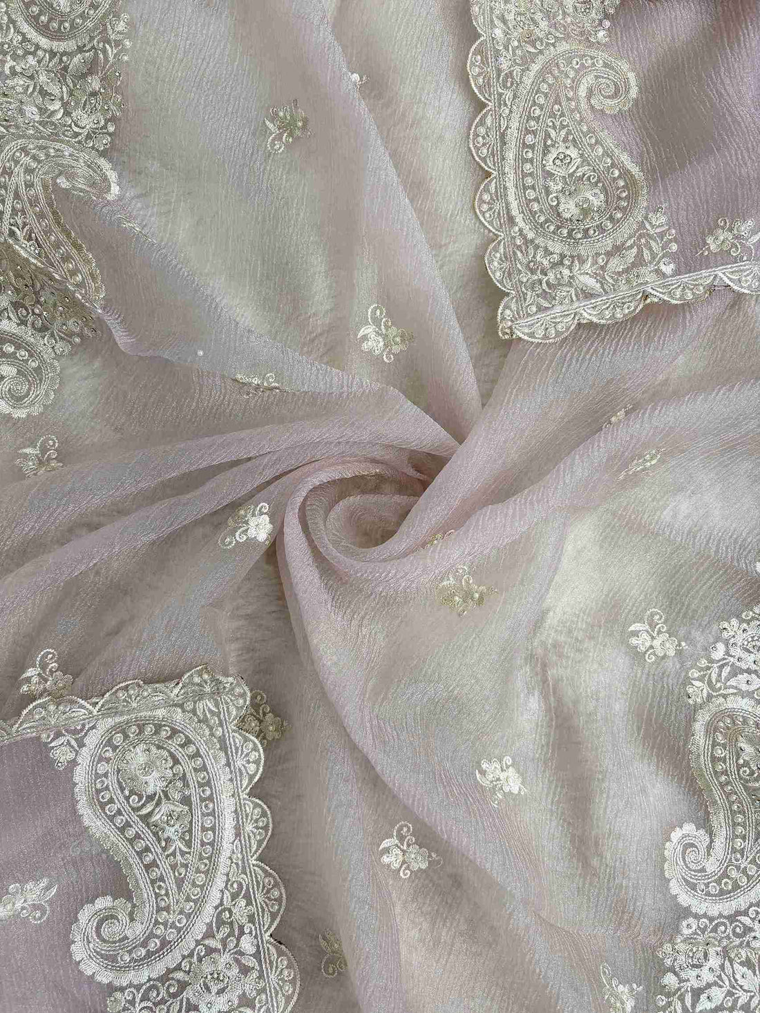 Paisley cutwork border with scalloped finishing along Pink marble chiffon dupatta edge