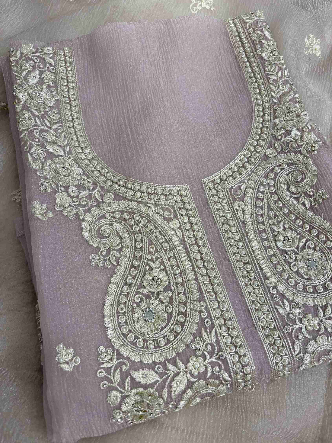 Complete Pink marble chiffon unstitched suit flat lay set with shirt, dupatta, and opada silk bottom