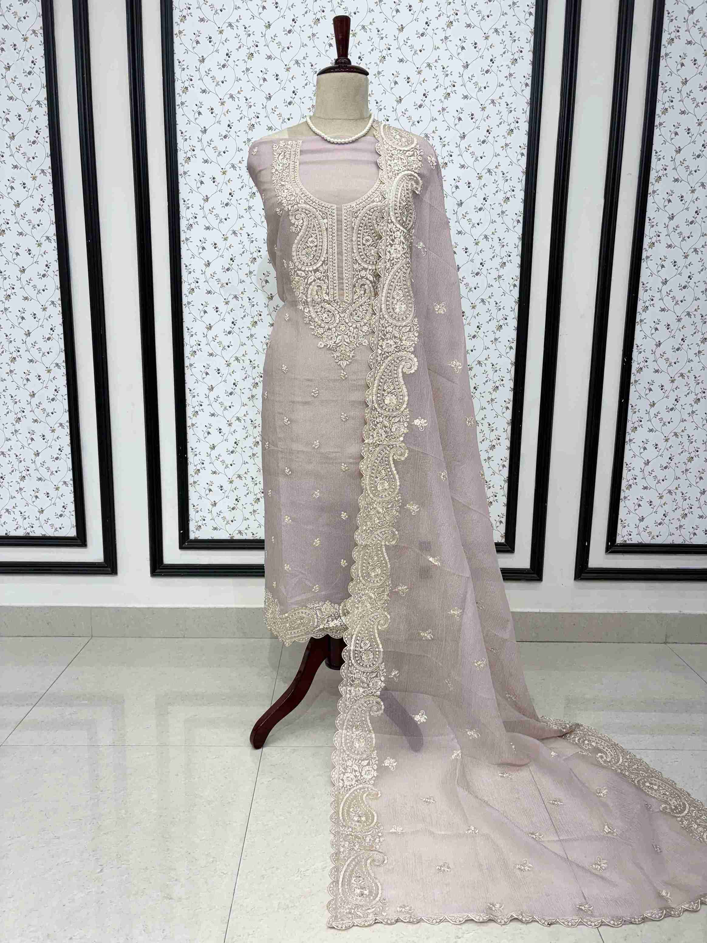 Pink marble chiffon unstitched suit full front view with paisley cutwork dupatta draped on mannequin