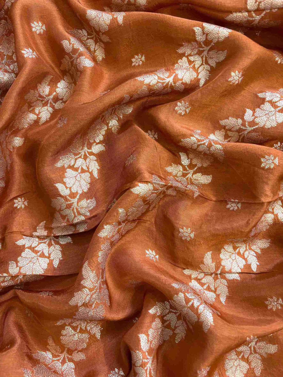 satin organza orange unstitched suit with zardozi neckline