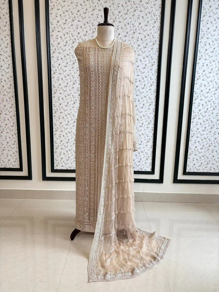 beige color georgette chikankari party wear unstitched suit for women
