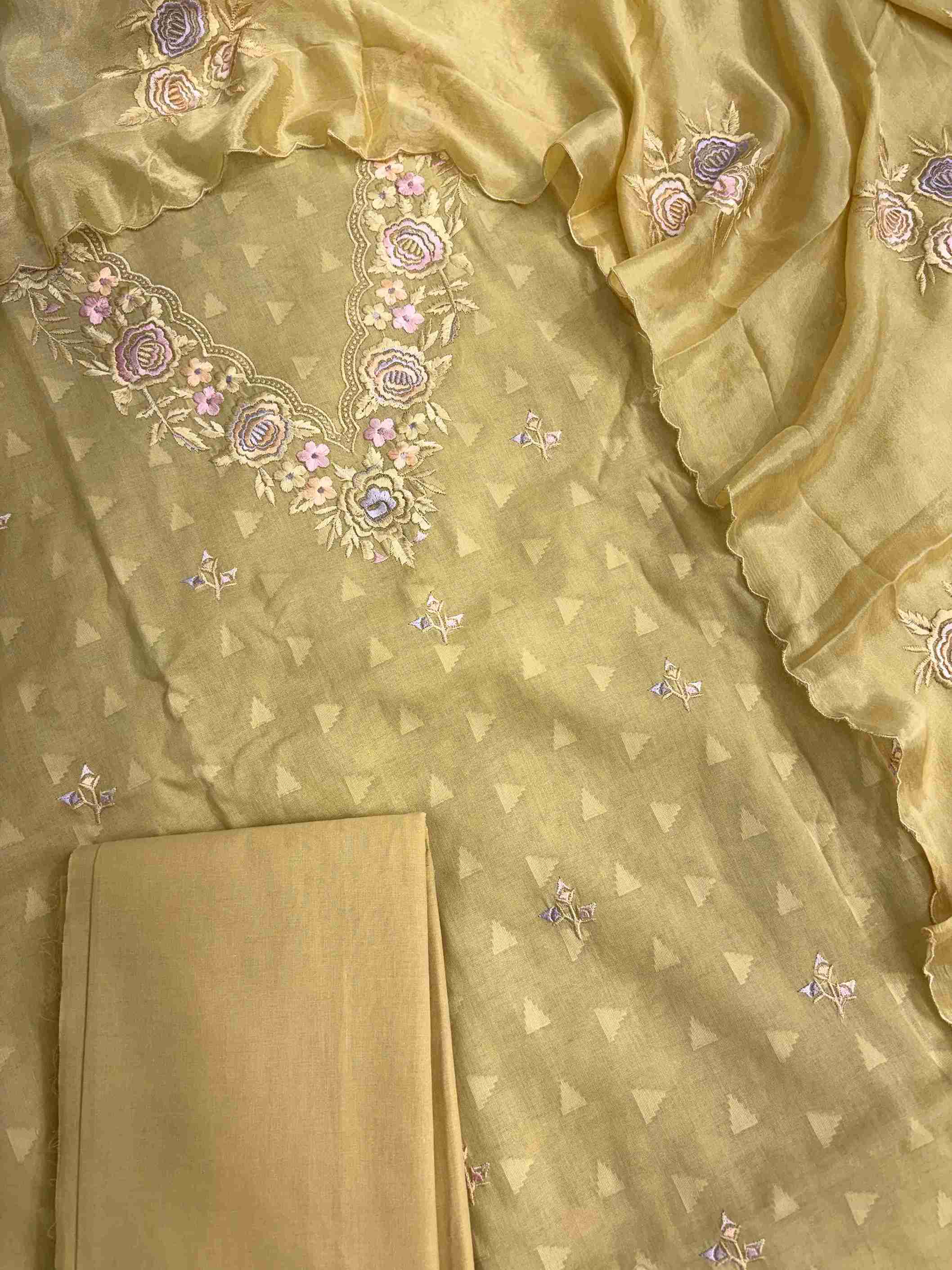antique gold cotton suit with embroidered booties and lace style embroidered daaman