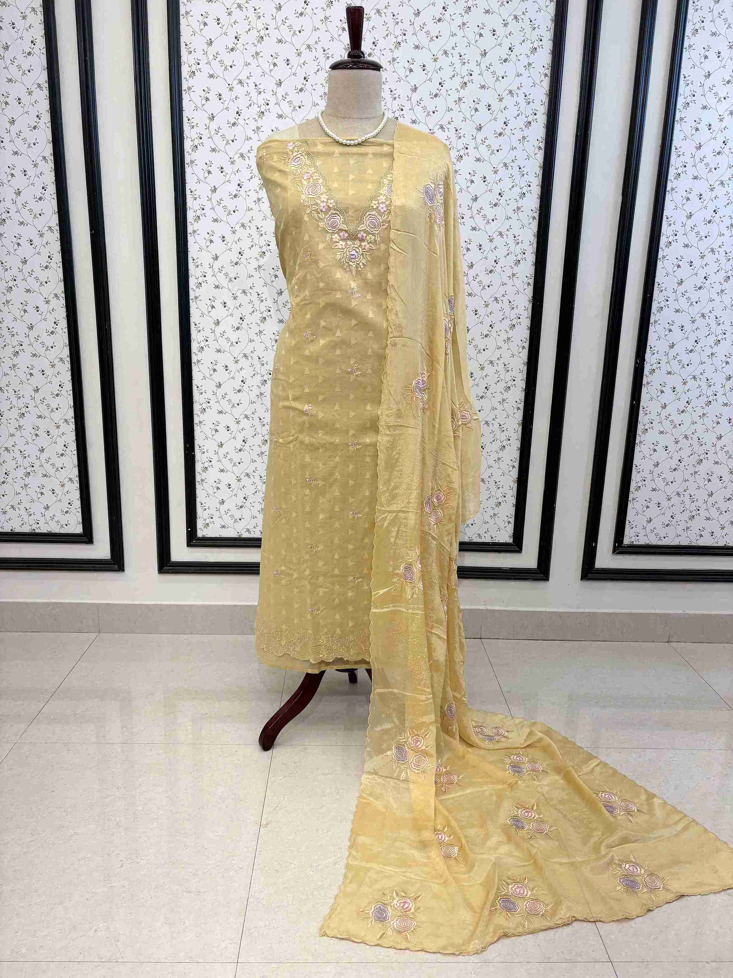 Elegant antique gold cotton unstitched suit set with embroidered chinnon dupatta on manequinn